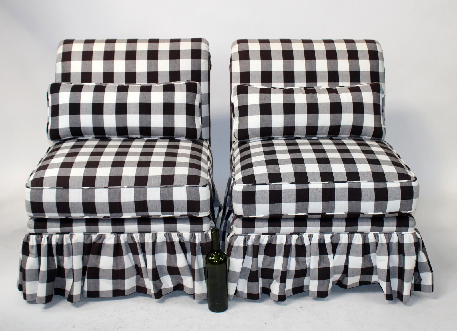 Pair of gingham check slipper chairs: Pair of gingham check upholstered slipper chairs. Unmarked makerLate 20th century. 33"h x 25"w x 27"d