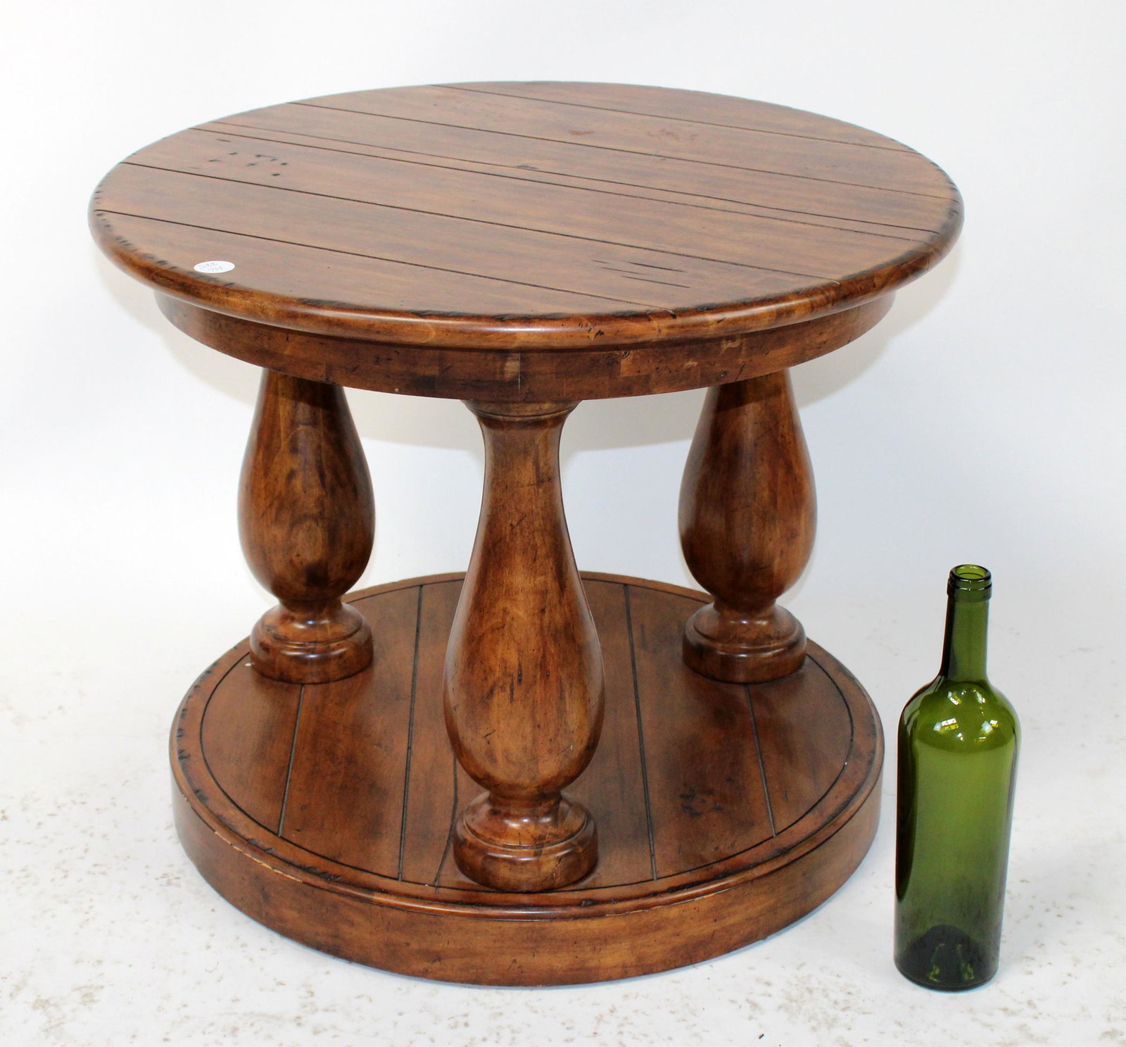 Plank top round side table: Plank top round side table. 21st century. 19 1/2"h x 24" dia