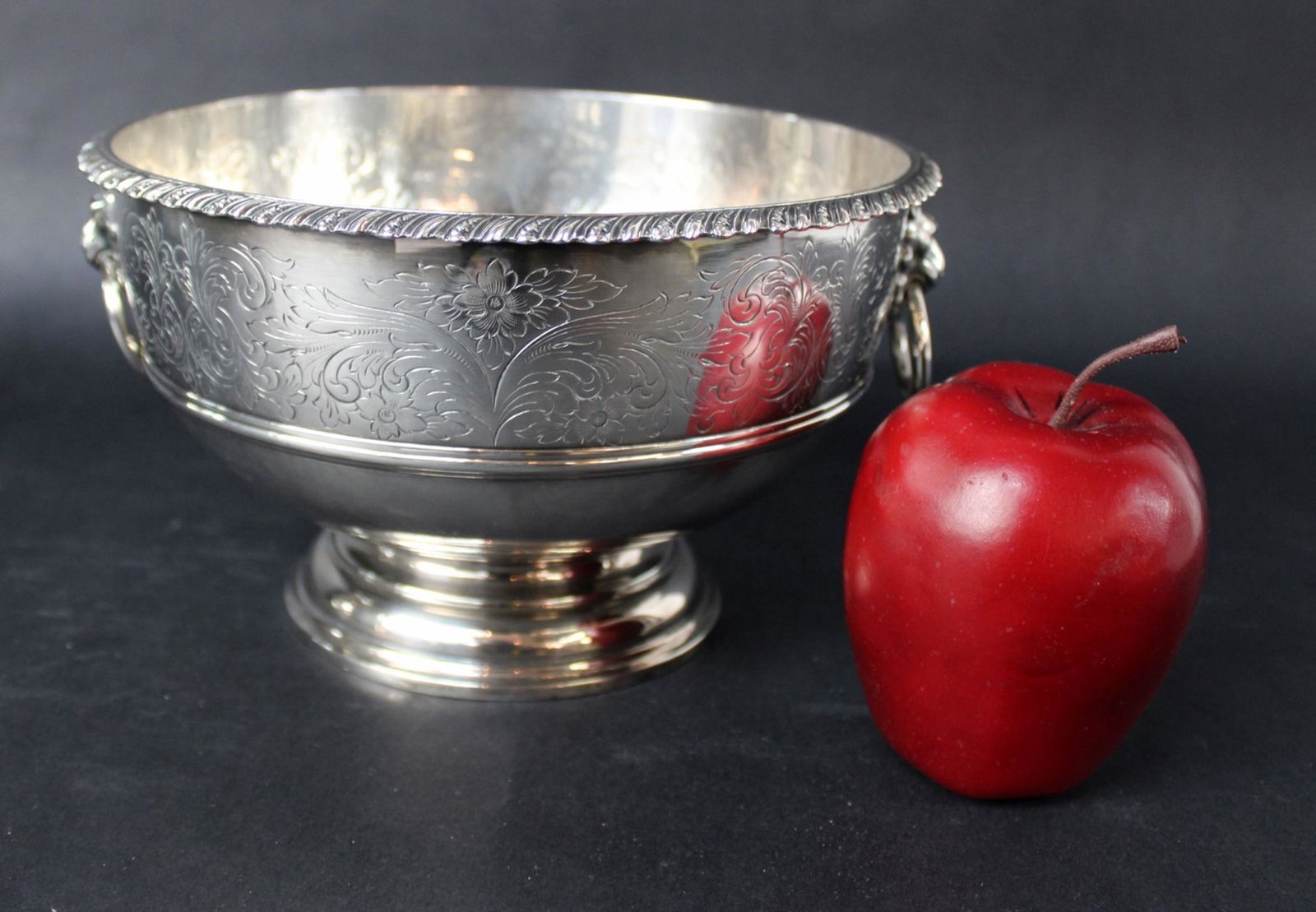 Barker Ellis silver plate footed trophy bowl: Barker Ellis silver plate footed trophy bowl with lions. Marked on bottom England Barker Ellis. 5"h x 8 1/2" dia