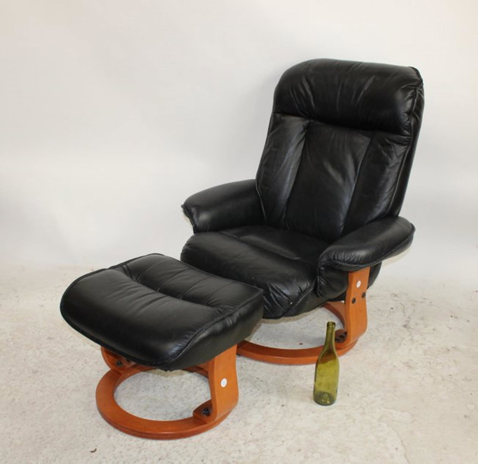 Modern black leather chair and ottoman (1 of 5)