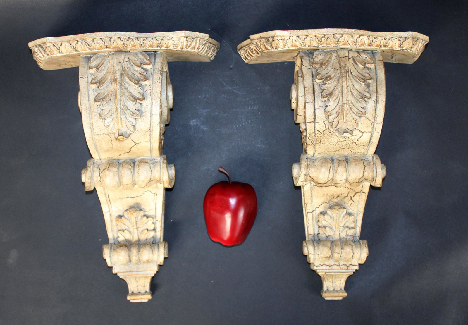 Pair of cast faux marble painted corbels: Pair of cast faux marble painted corbels. 15"h x 11"w x 5 3/4"d
