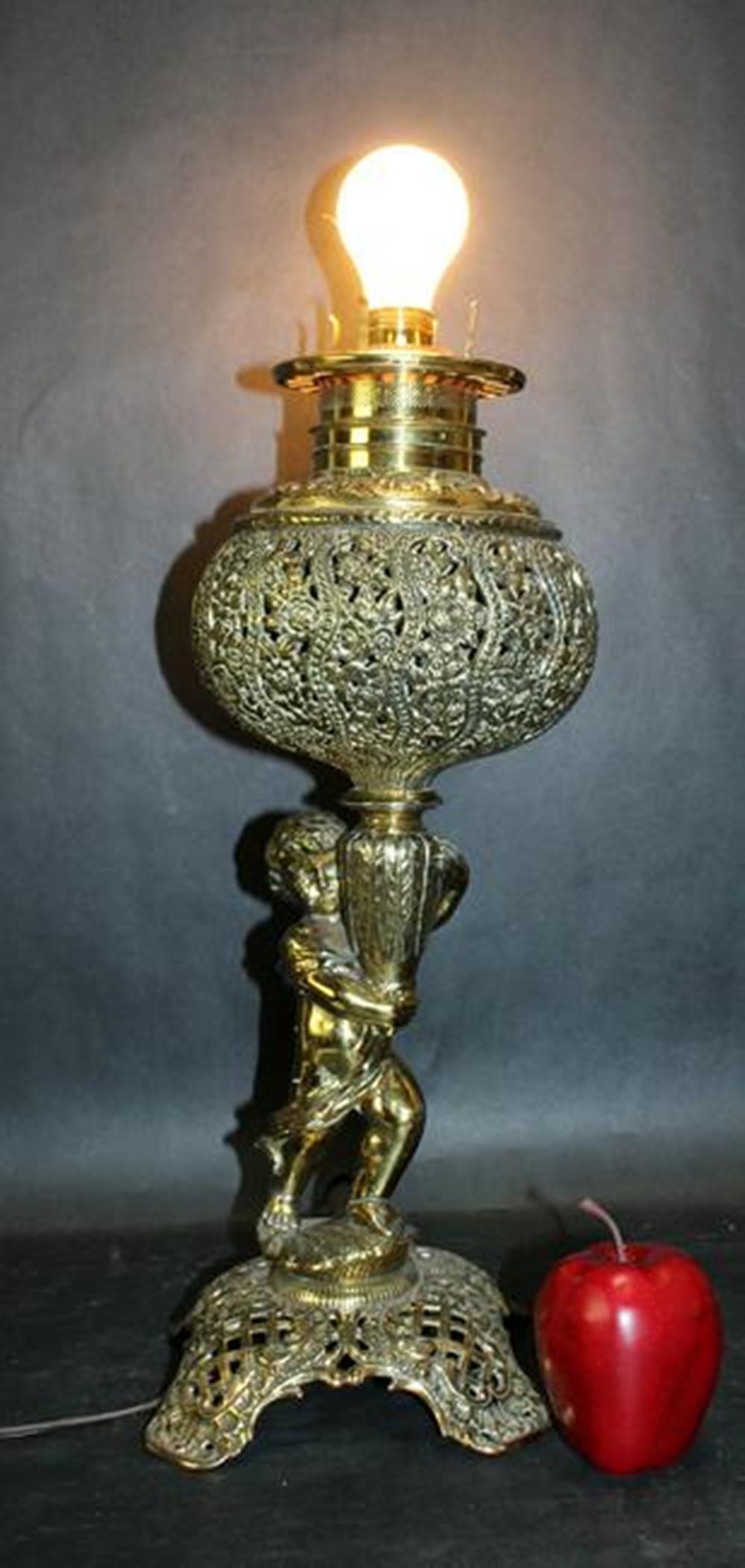 Brass cherub form converted oil lamp (1 of 3)