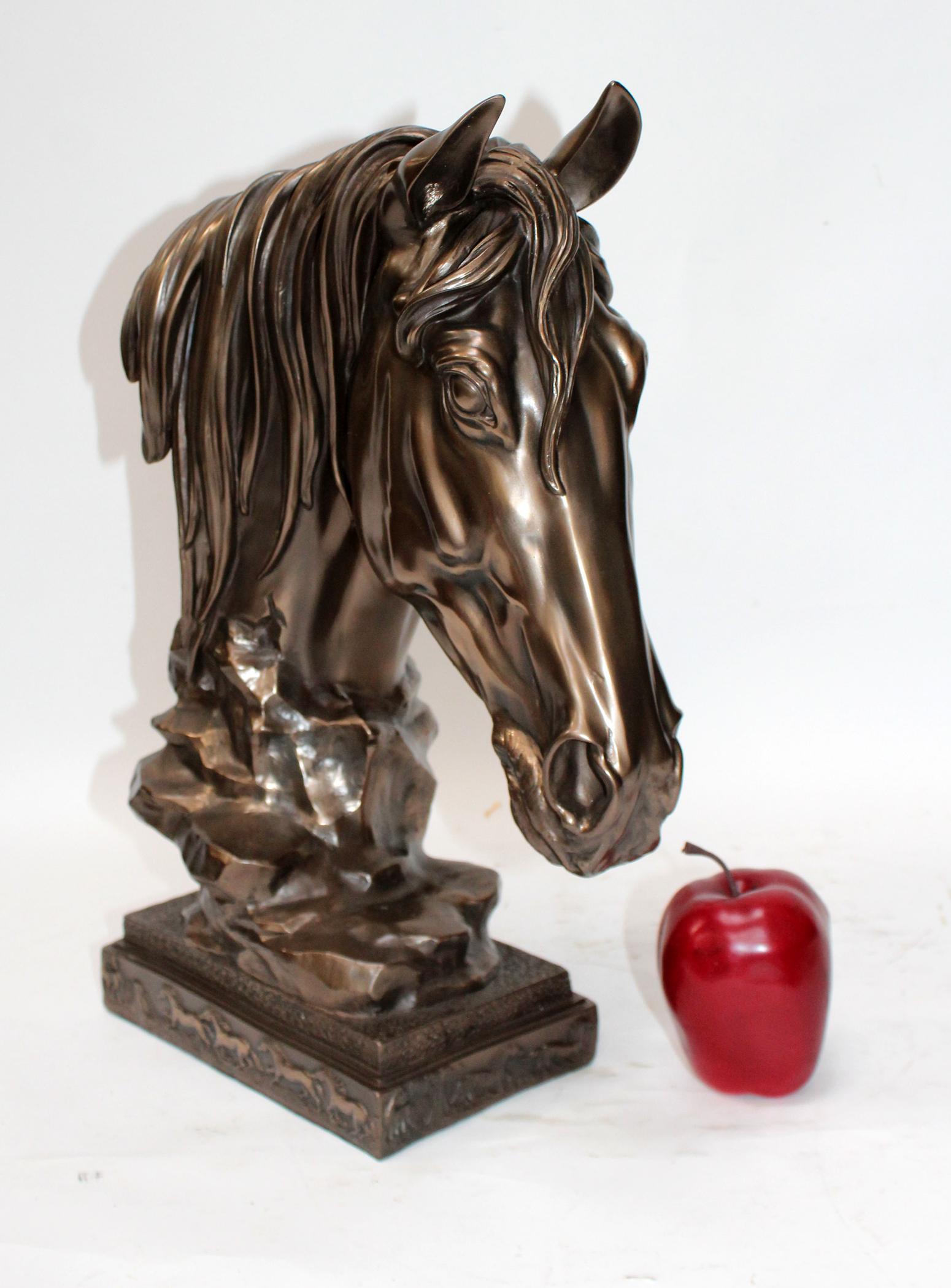 Cast horse head sculpture in bronze finish: Cast horse head sculpture in bronze finish. Late 20th century. 17"h x 13"w
