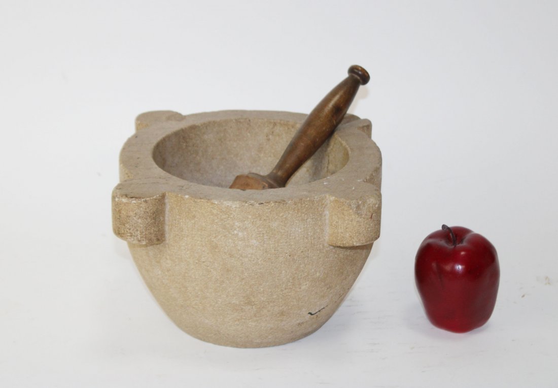Antique French stone mortar with wood pestle: Antique French stone mortar with wood pestle. 6 1/2"h x 12"diam Pestle 8 1/4"h x 3"diam