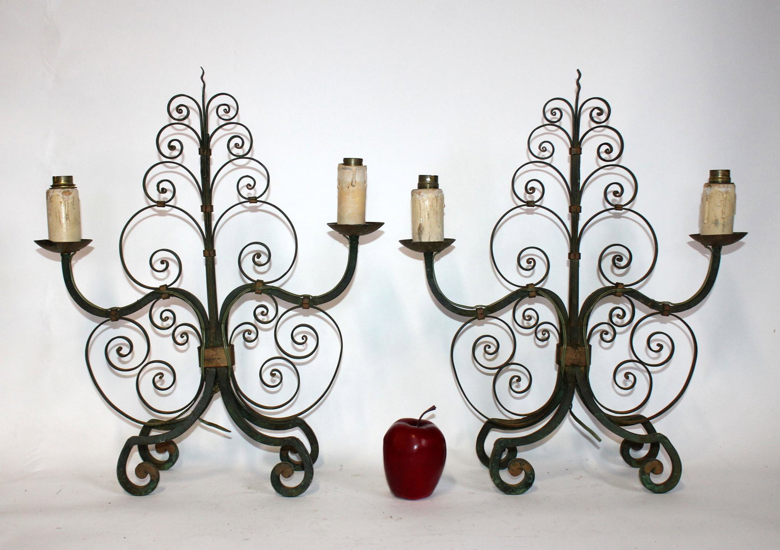 Pair of French scrolled iron candelabra: Pair of French scrolled iron 2-arm candelabra. 20"h x 17"w