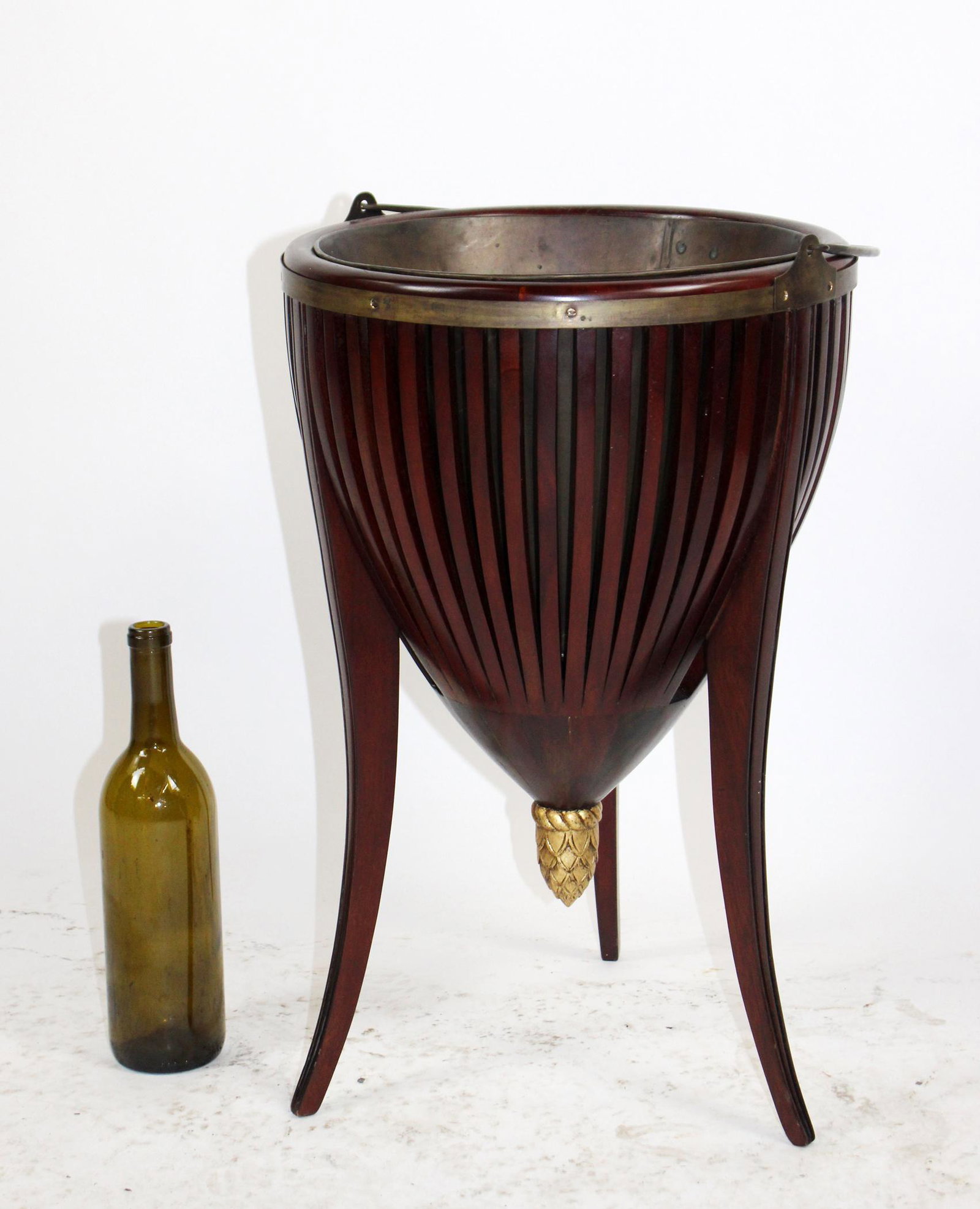 Neo Classical style mahogany jardiniere: Neo Classical style mahogany jardiniere or cellarette. Late 20th century. 21 1/2"h x 14" dia, 30" with the handle