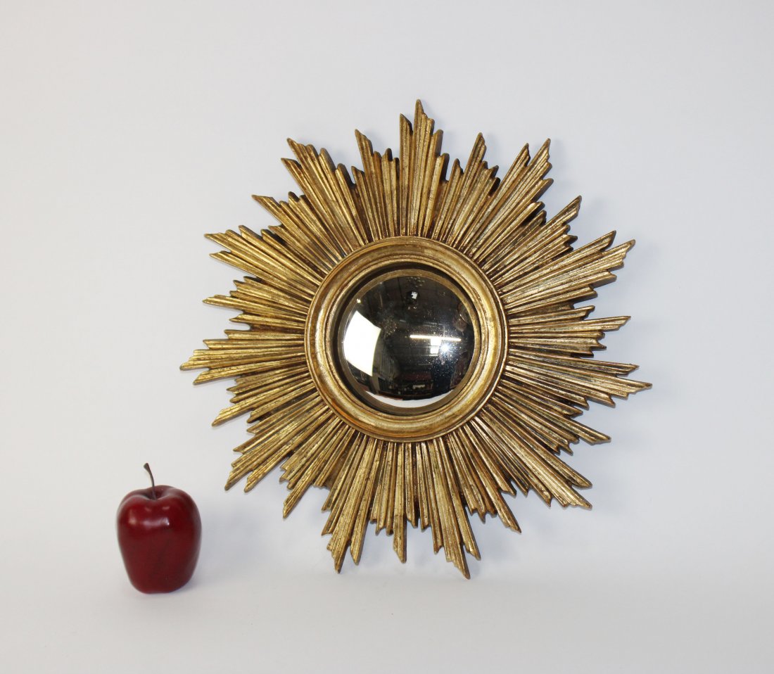 Vintage cast gilt sunburst mirror with convex glass: Vintage Italian cast gilt sunburst mirror with convex glass. Circa 1970's. Overall 17 1/2"diam. Mirror 5"diam