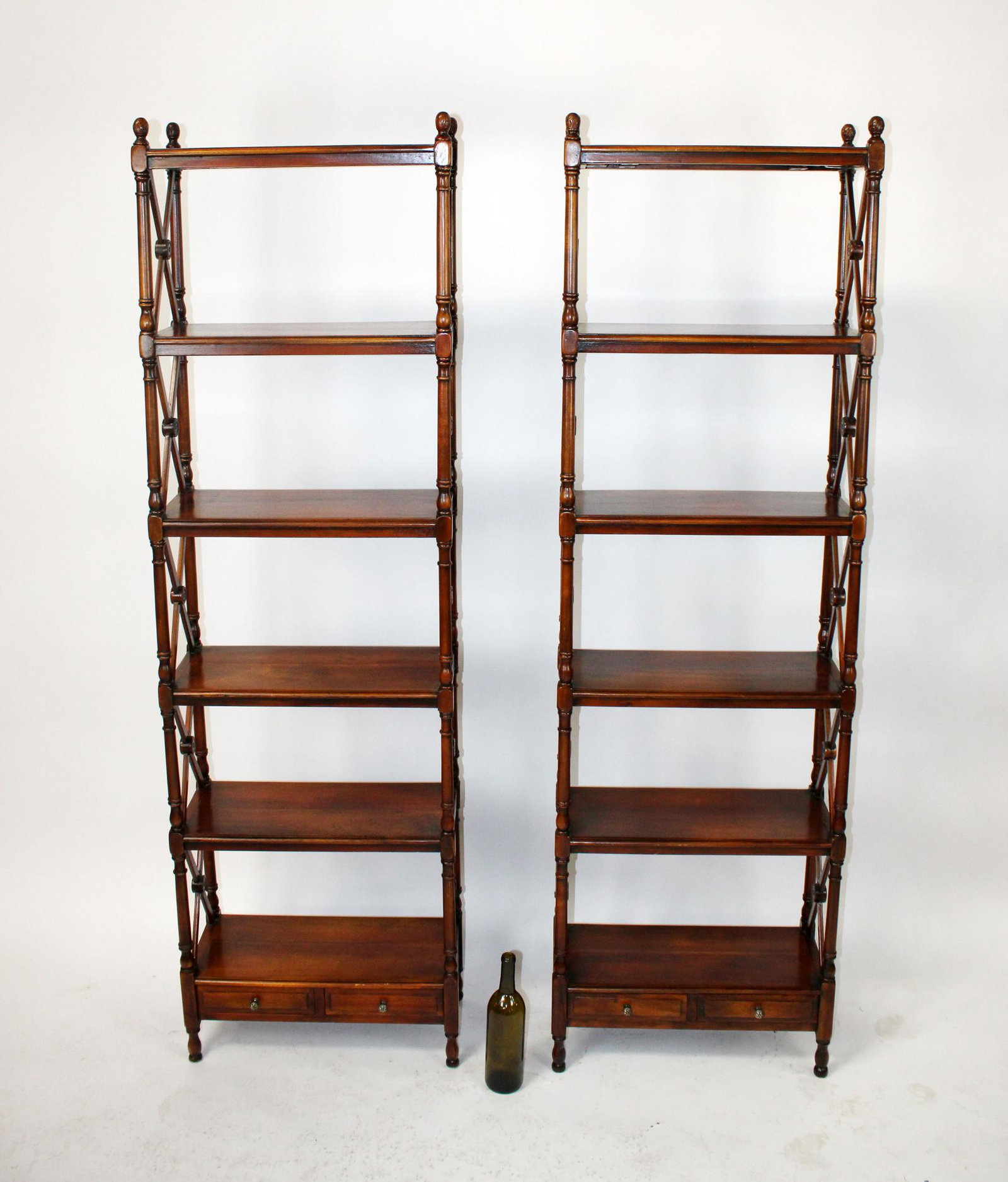 Pair of mahogany open etagere with drawers: Pair of mahogany open etagere with drawers. Late 20th century. 73 3/4"h x 22"w x 10 1/4"d each