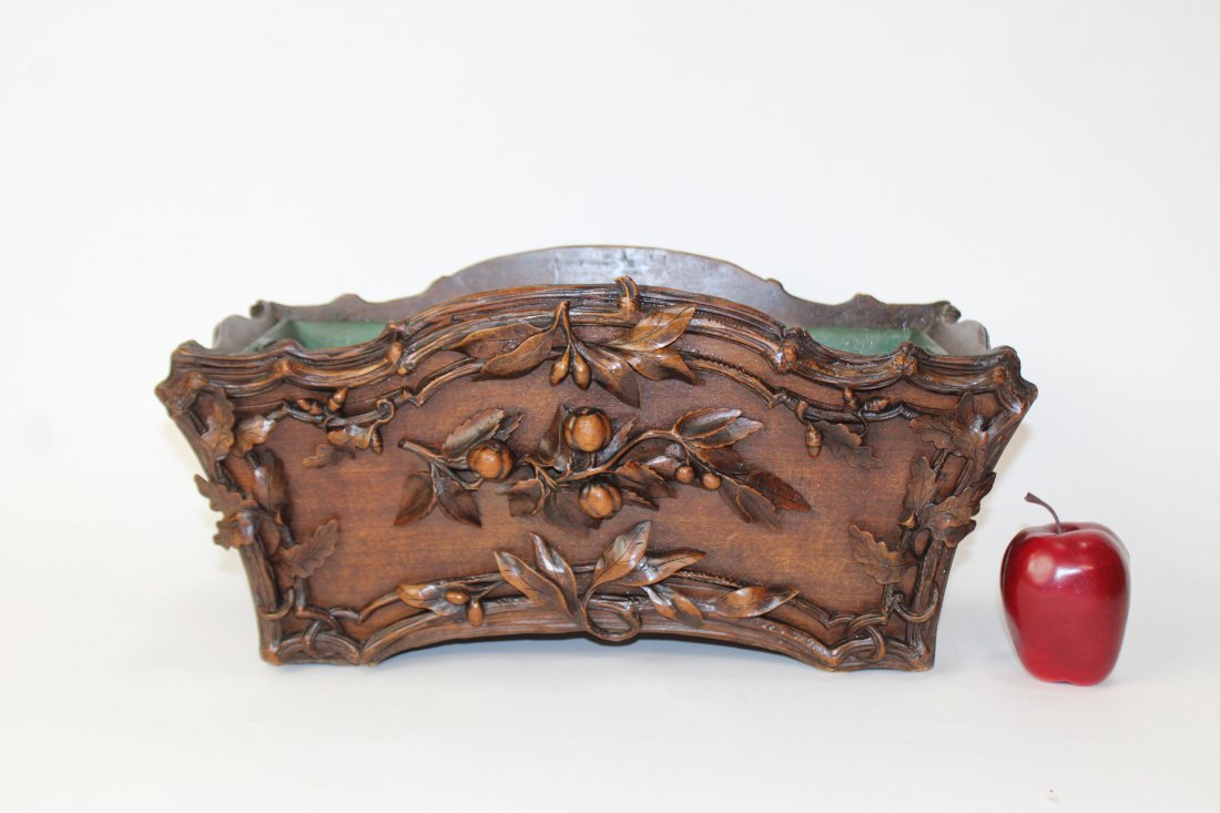 French Black Forest carved walnut jardiniere: French Black Forest jardiniere planter box. Naturalistic frame with oak leaf and acorn motif. Late 19th century. 9 1/4"h x 19 1/2"w x 10"d