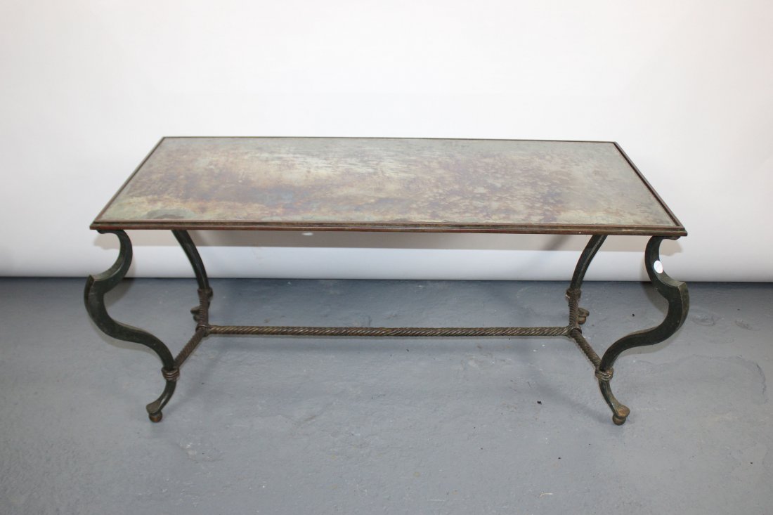 French mid century wrought iron coffee table: French mid century wrought iron coffee table with mirror top. Mid 20th century. 19 3/4"h x 45 1/2"w x 22"d