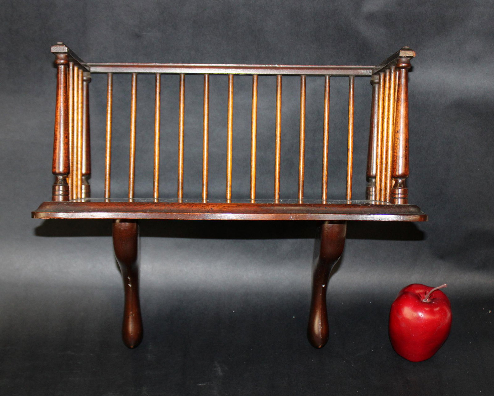 Mahogany spindle wall shelf: Mahogany spindle wall shelf. Mid 20th century. 14"h x 16 1/4"w x 7 5/8"d