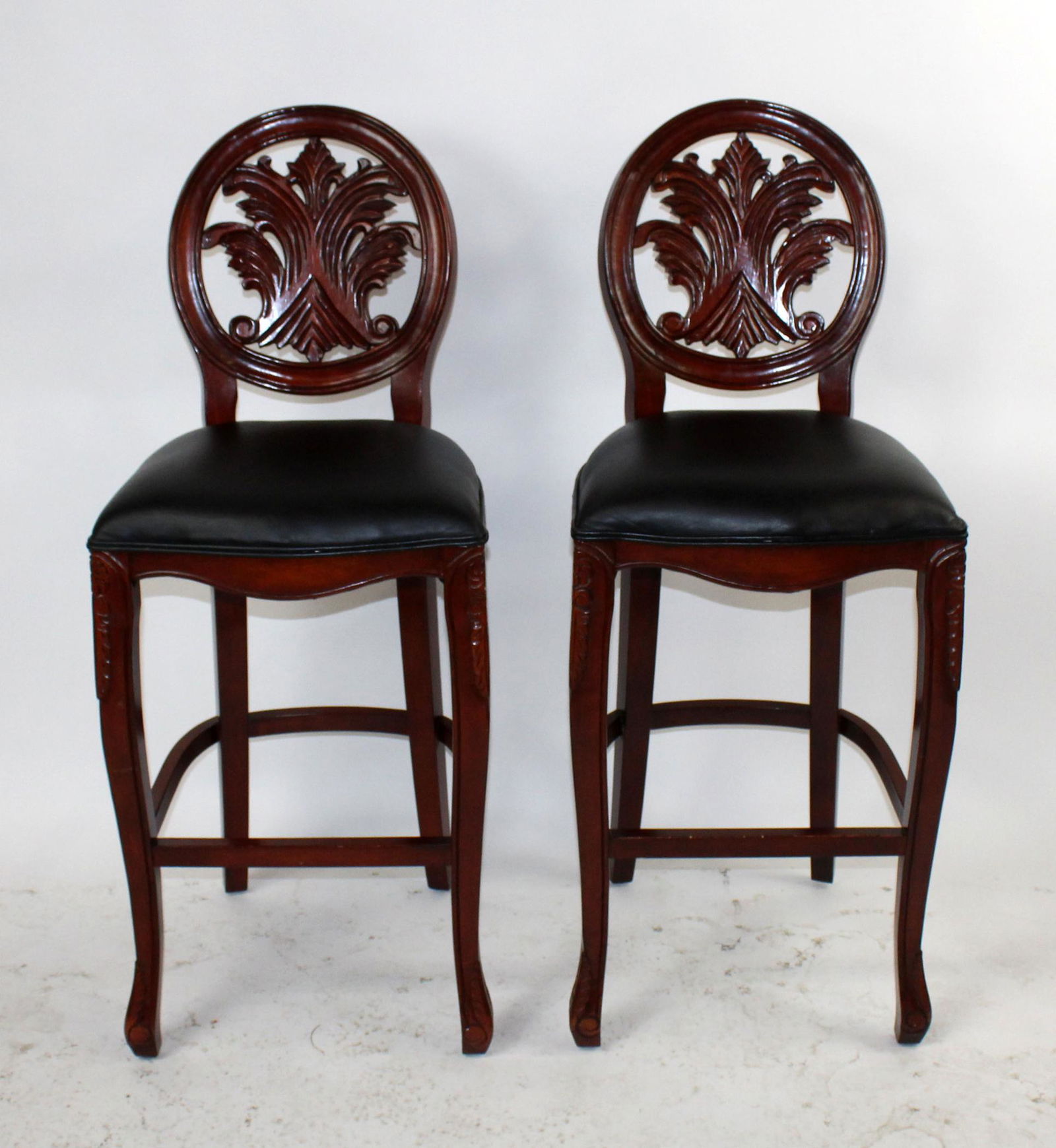 Pair of mahogany foliate back barstools (1 of 5)