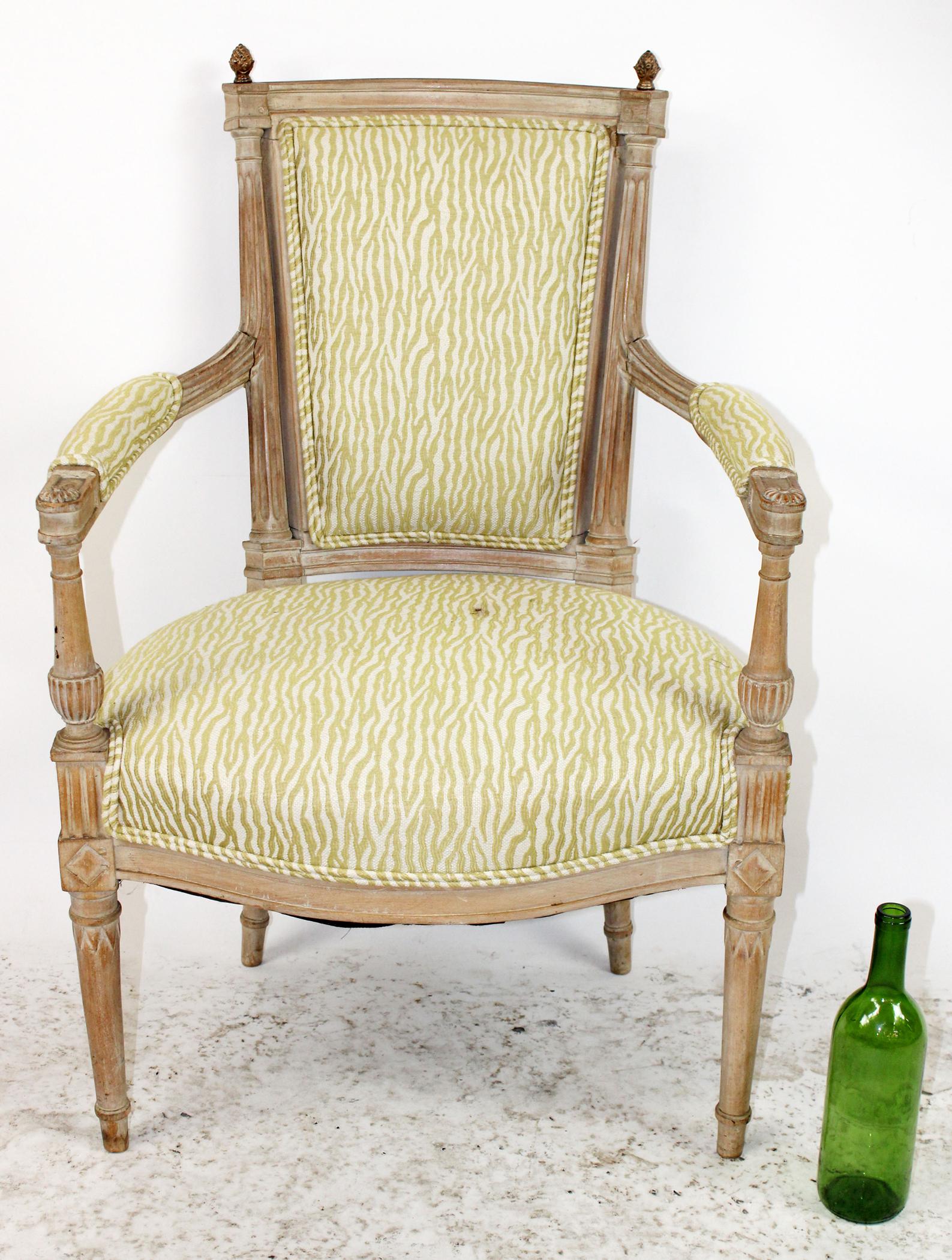 French Louis XVI style armchair: French Louis XVI style amrchair with bronze pinecone finials. Mid 20th century.