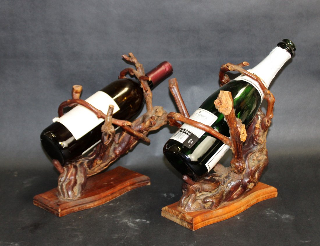 Pair French grape vine wine bottle holders: Pair French grape vine wine bottle holders. 9 1/2"h x 11"l x 6 1/2"d and 10"h x 9 1/2"l x 7"w