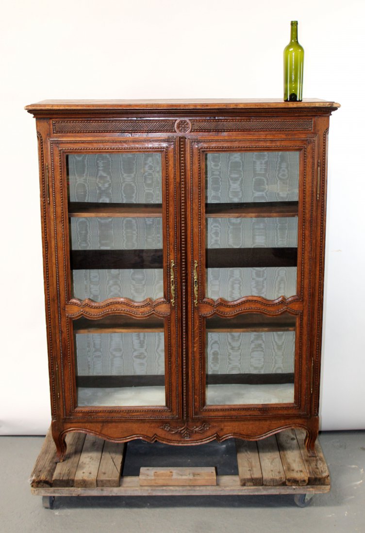 French Provincial 2 door bookcase in carved oak (1 of 10)