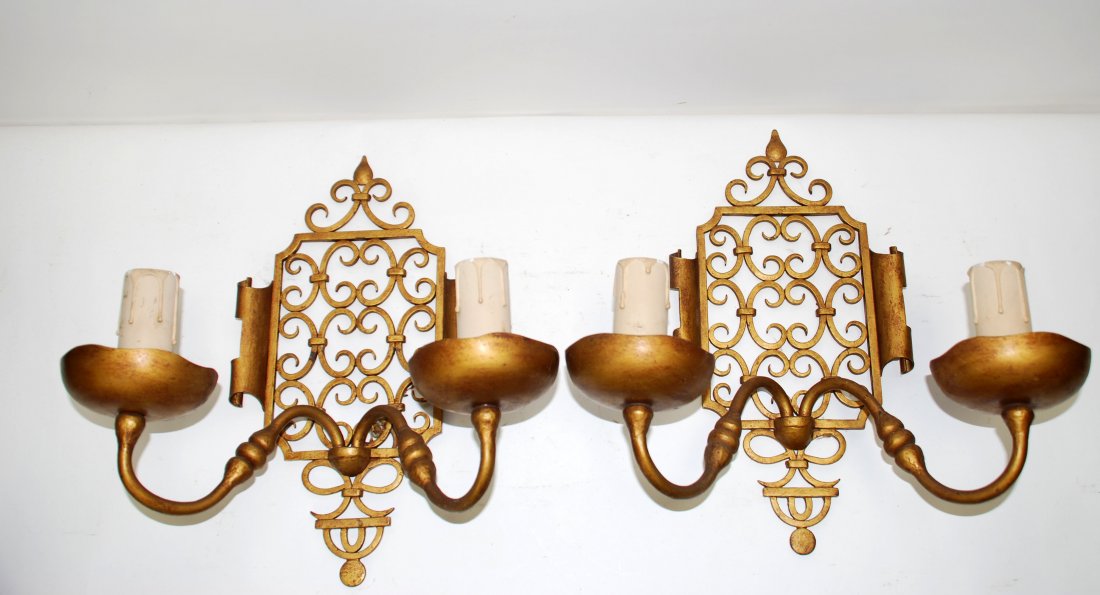 Pair of French gilt iron wall sconces: Pair of French gilt iron wall sconces. Mid 20th century. 14 1/2"h x 15"w