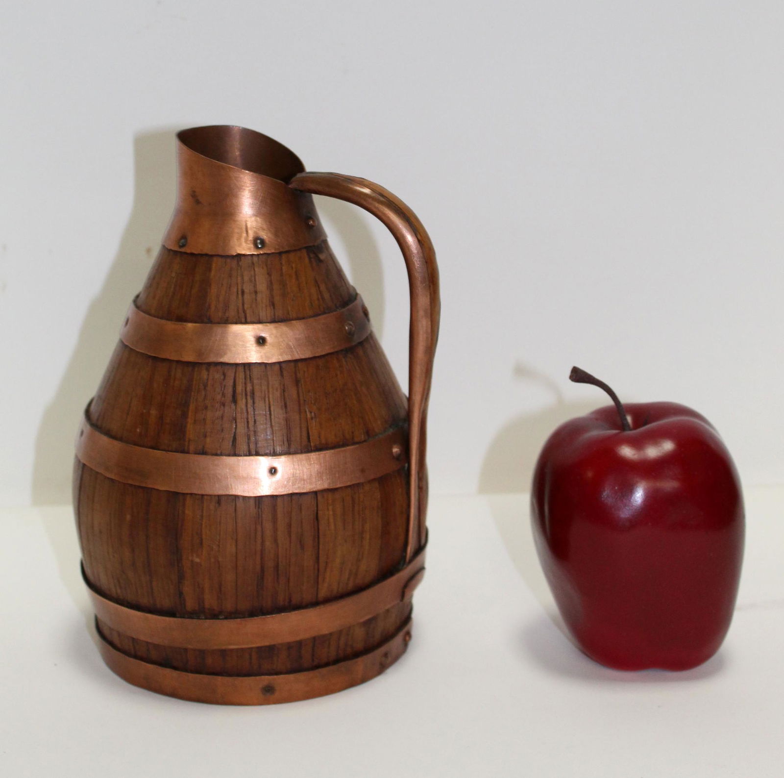 French Alsacian mini wine pitcher in oak and copper: French Alsacian mini wine or cider pitcher in oak with copper. Early 20th century. 8"h x 5"w