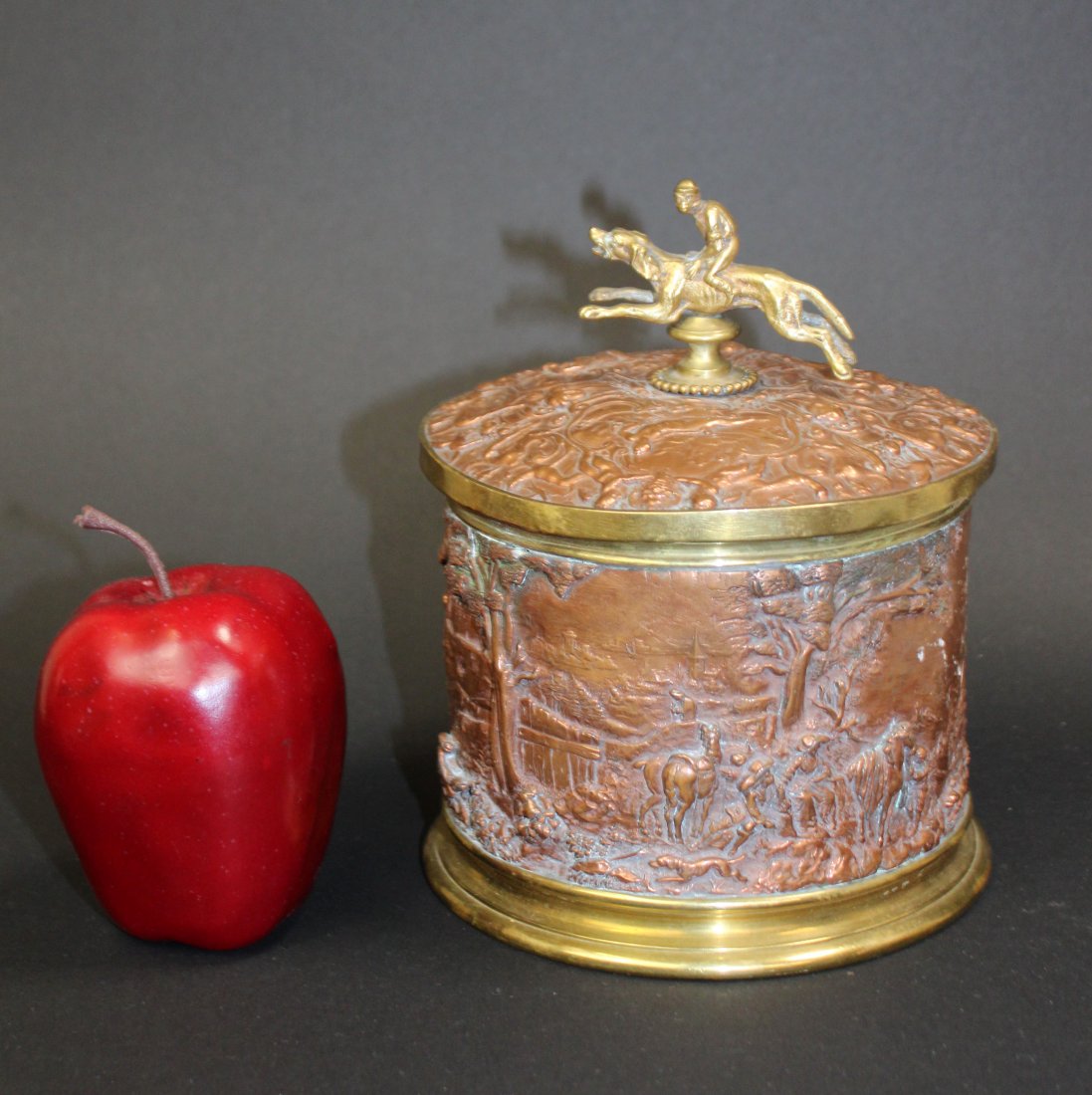 French copper relief tobacco jar: French copper relief tobacco jar with hunting dog finial. Late 19th century. 7 1/2"h x 6"diam