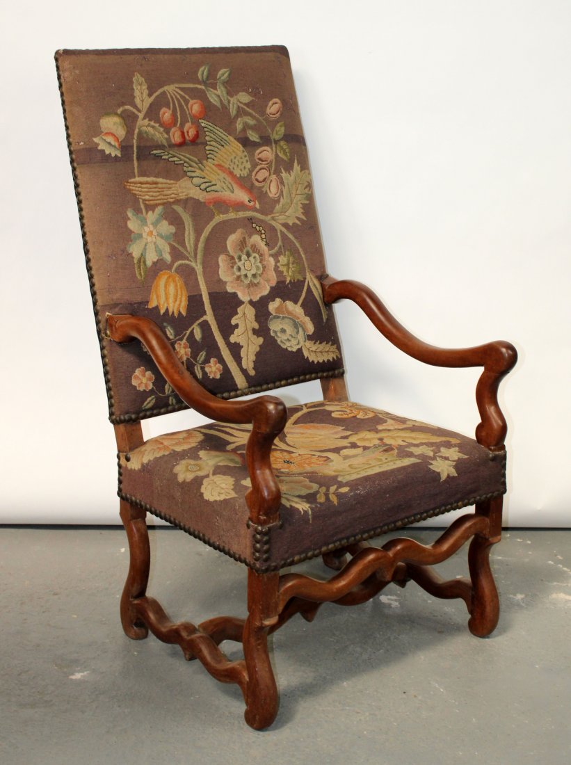 French os du mouton armchair with needlepoint: French os du mouton armchair with needlepoint upholstery. Early 20th century. 46"h x 24 1/2"w x 28"d,