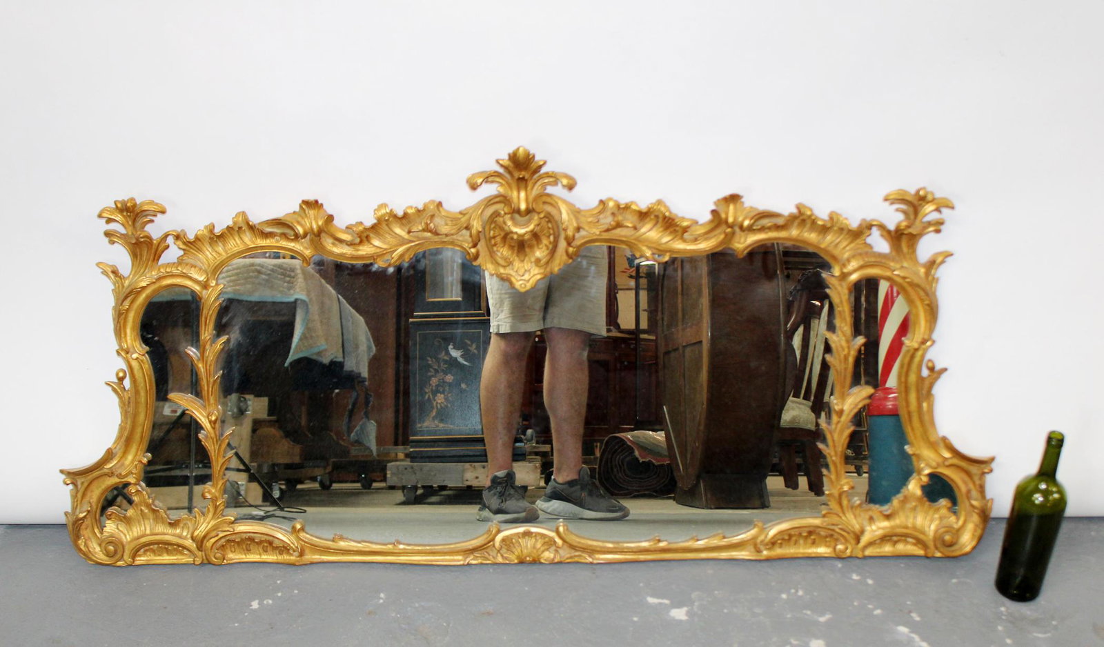 Italian Chippendale mirror with gilt finish: Italian Chippendale style mirror with gilt finish. Late 20th century. 27"h x 58"w