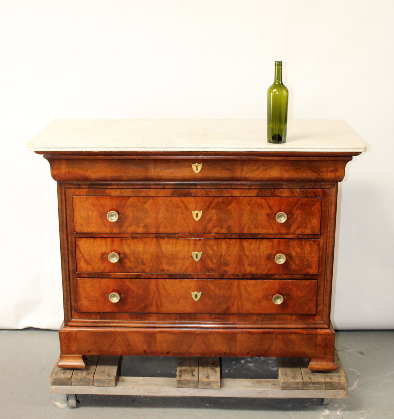 French Louis Philippe commode in burled walnut: French Louis Philippe commode in burled walnut with marble top. 19th century. 38 1/2"h x 49 3/4"w x 21 3/4"d