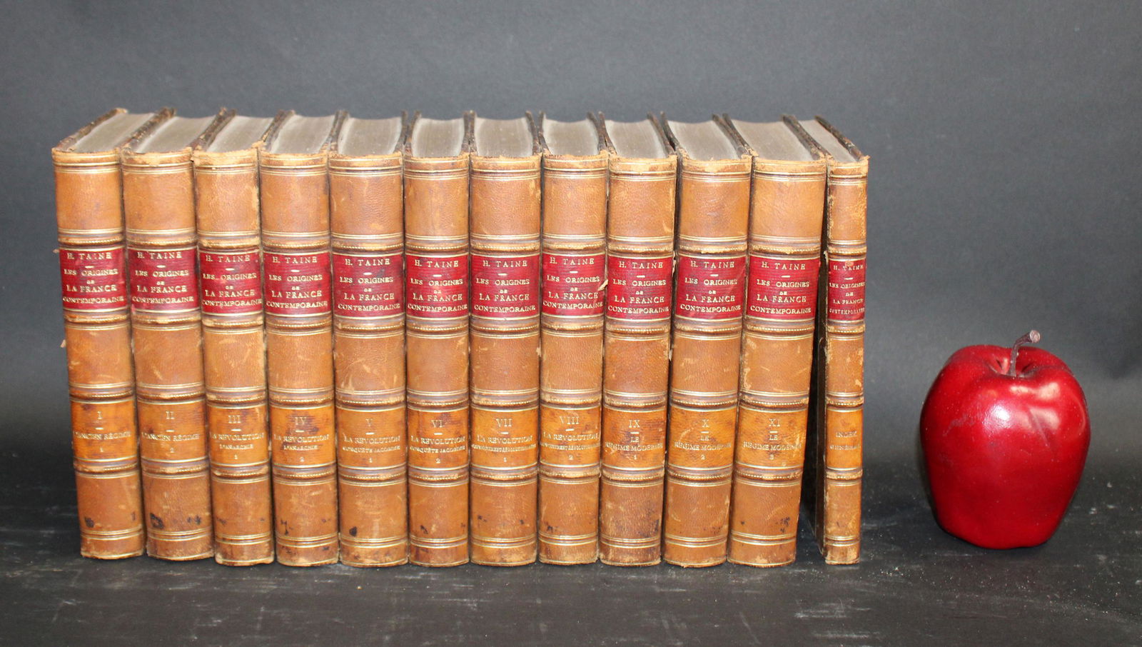Lot of 12 French leather bound books: Lot of 12 French leather bound books. 11 volumes Les Origines de la France Contemporaines plus 1 index. Published 1899 - 1901. 7 1/4"h