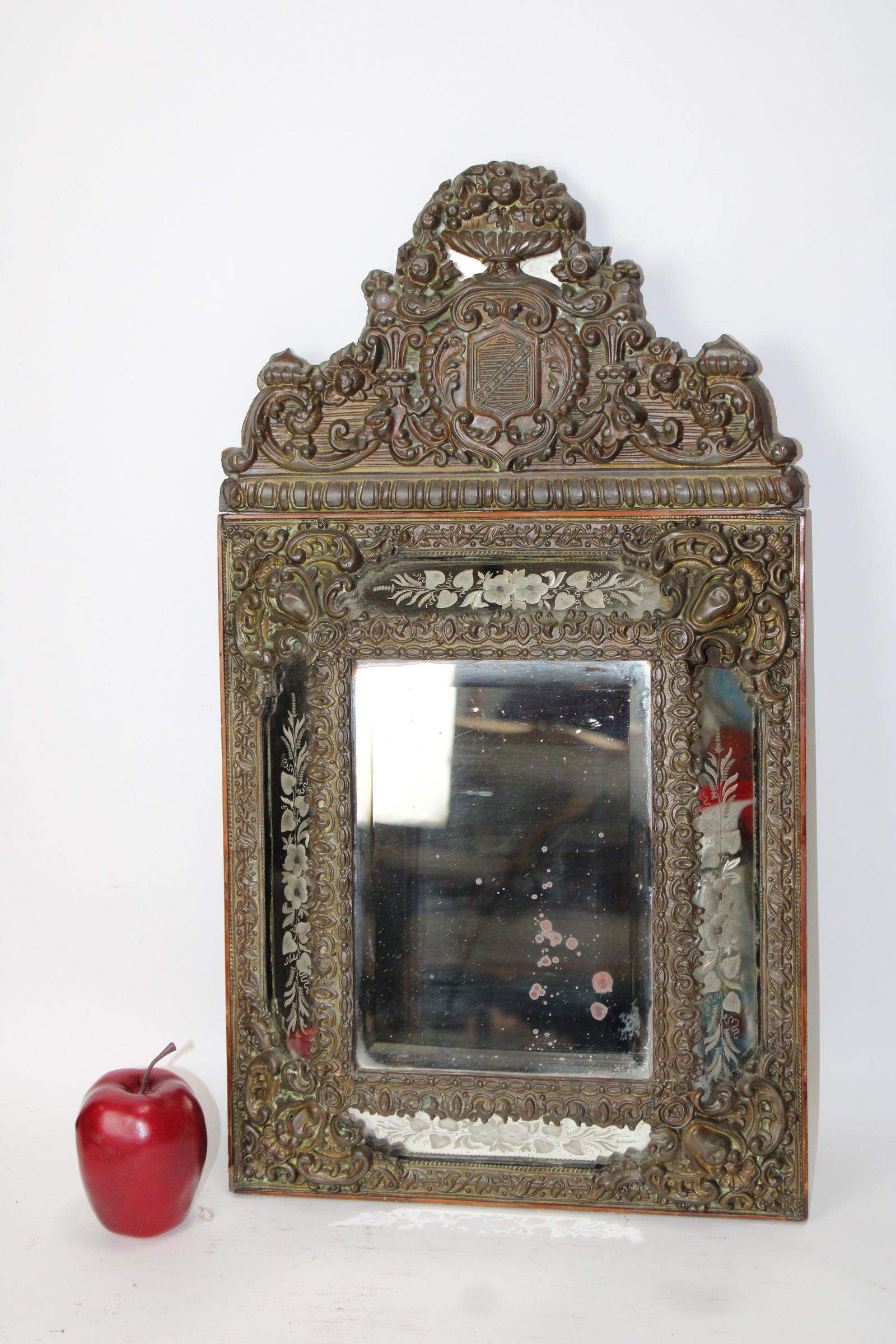 Antique embossed brass mirror with  shield (1 of 9)