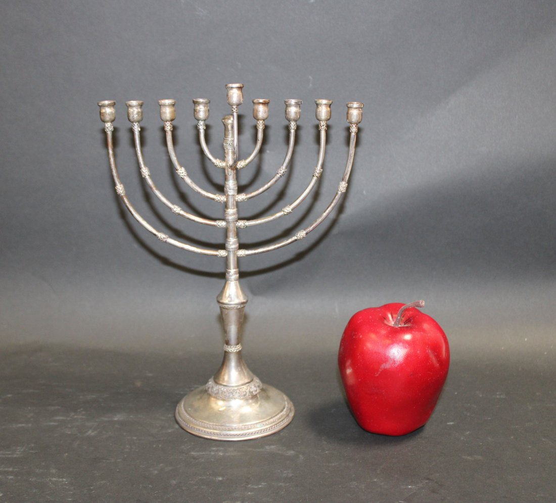 Nadav sterling silver kinetic menorah with shamash: Nadav sterling silver kinetic menorah with shamash. Marked on bottom Nadav 925 Handmade in Israel . 10"h x 7 1/2"w