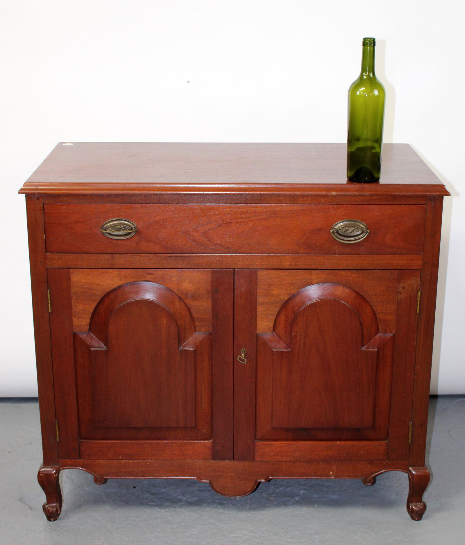 Vintage mahogany cabinet: Vintage mahogany cabinet with 2 doors and 1 drawer. Late 20th century. 32 1/4"h x 36"w x 18 3/4"d