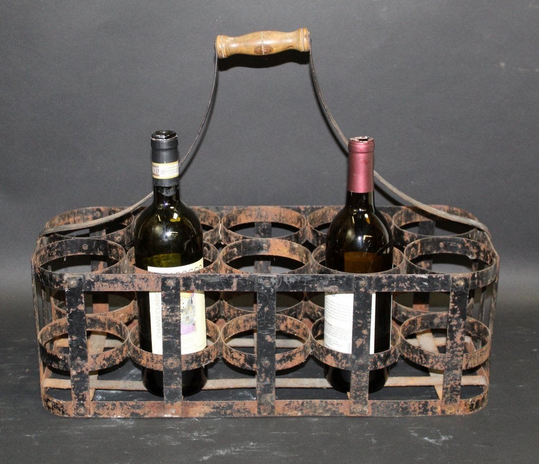 French wine bottle carrier with wooden handle: French wine bottle carrier with wooden handle. Holds 10 bottles. Early 20th century. 18"h x 20 1/2"w x 9"d