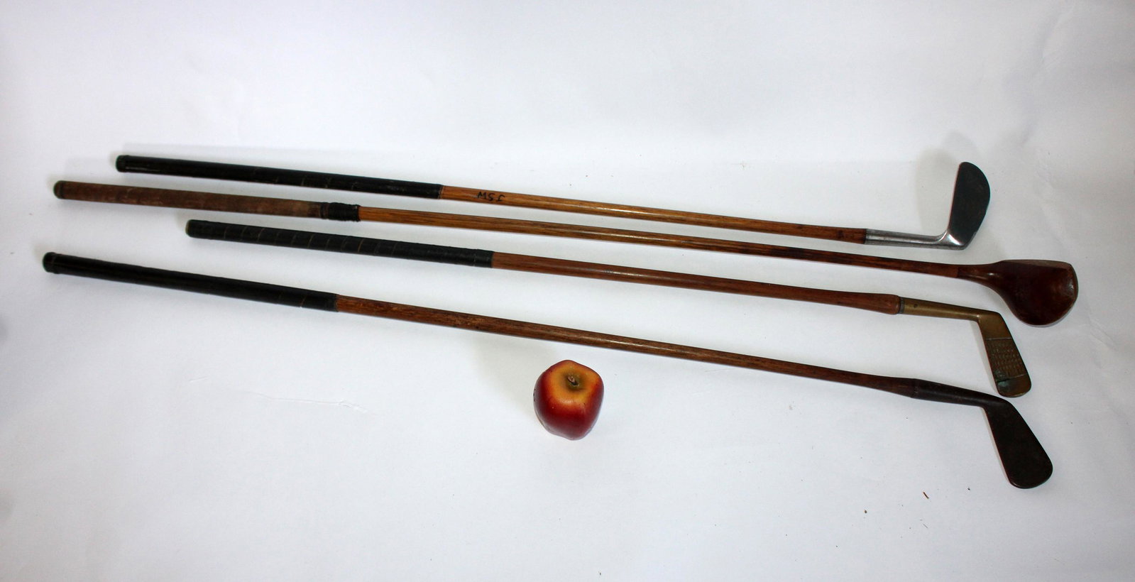 Lot of 4 Antique golf clubs: Lot of 4 Antique golf clubs. Early 20th century. 36"-43"l