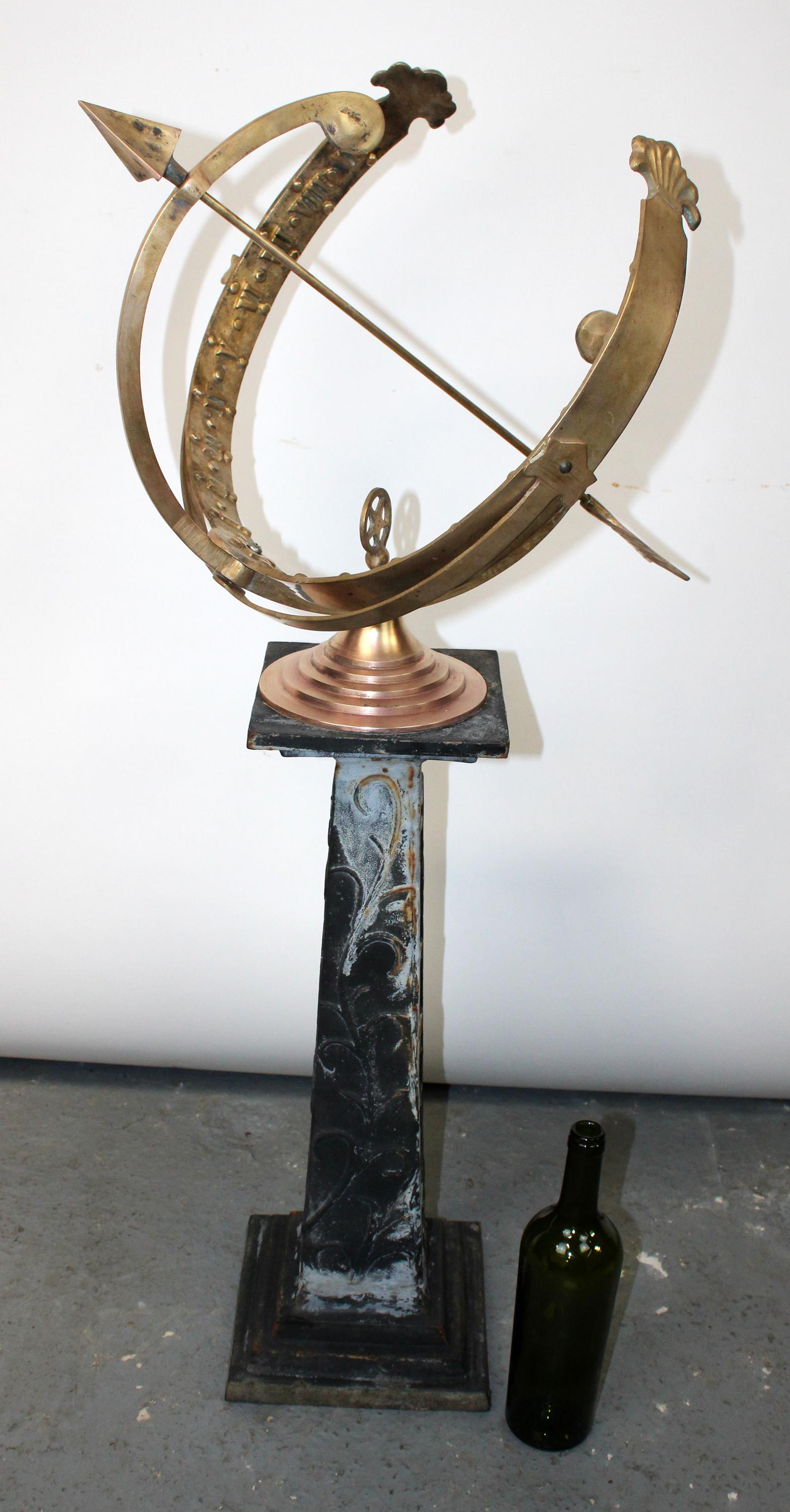 Polished bronze armillary sundial on iron base (1 of 9)