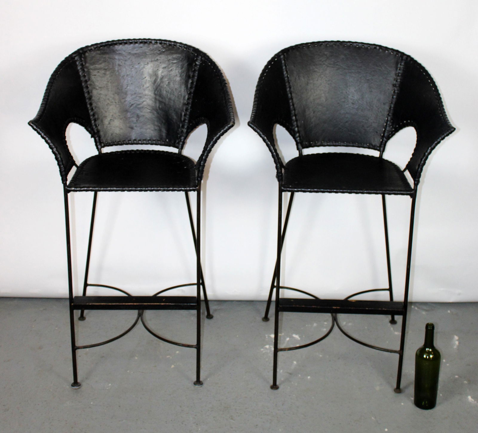 Pair of bull hide leather bar stools (1 of 8)
