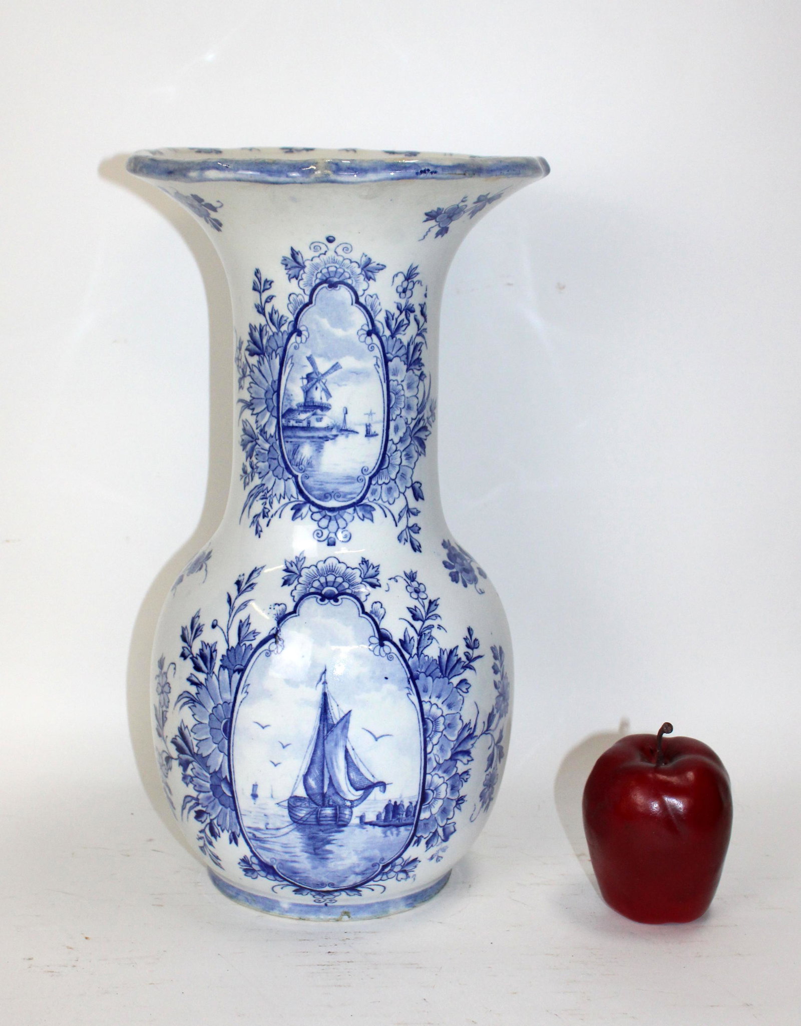 English blue & white pottery vase with sailboat: English blue & white pottery vase with sailboat. Mid 20th century. Blue underglaze mark and raised kitemark with R. 14 3/4"h x 8"w