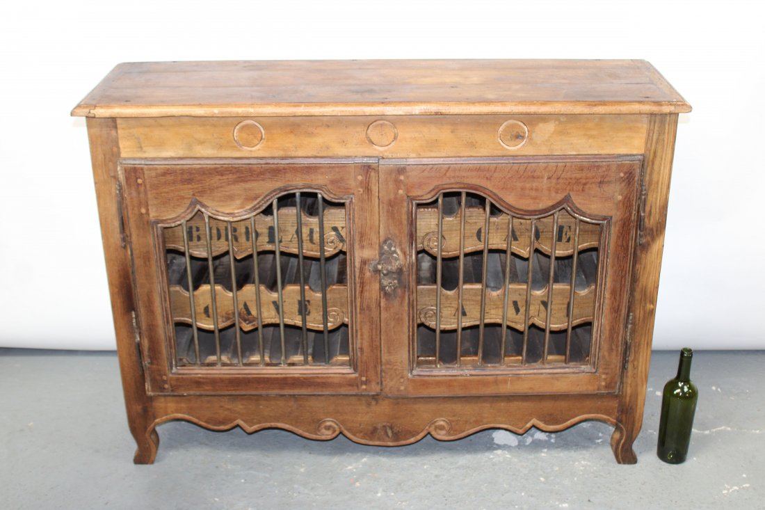 French Provincial 2 door wine buffet: French Provincial 2 door wine buffet in walnut with iron grills. 36"h x 50"w x 14 3/4"d