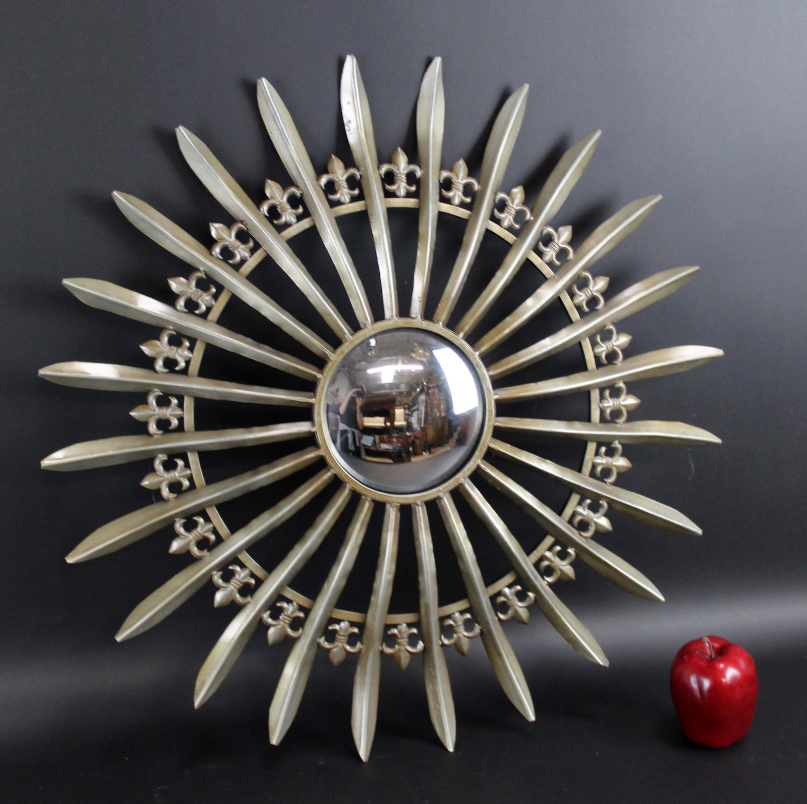 Modern sunburst style mirror with fleur de lys (1 of 3)