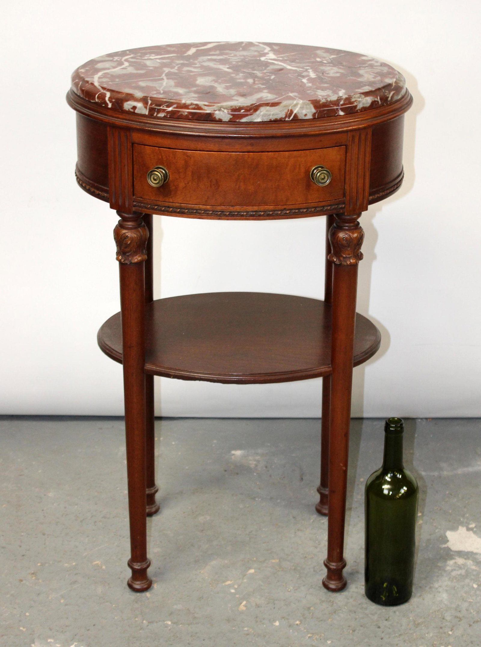 Louis XVI style oval chevet with marble top: Louis XVI style oval chevet with marble top. Mid 20th century. 31"h x 19"w x 14"d