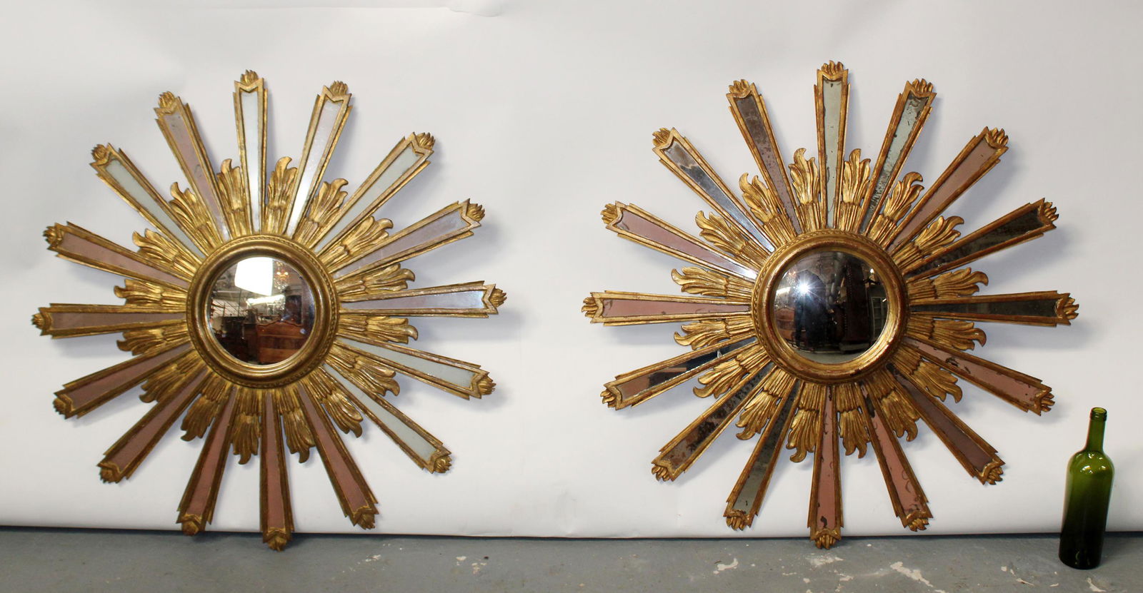 Pair of Italian mid century gilt wood sunburst mirrors: Pair of Italian mid century gilt wood sunburst mirrors with convex glass. Mid 20th century. 35" dia