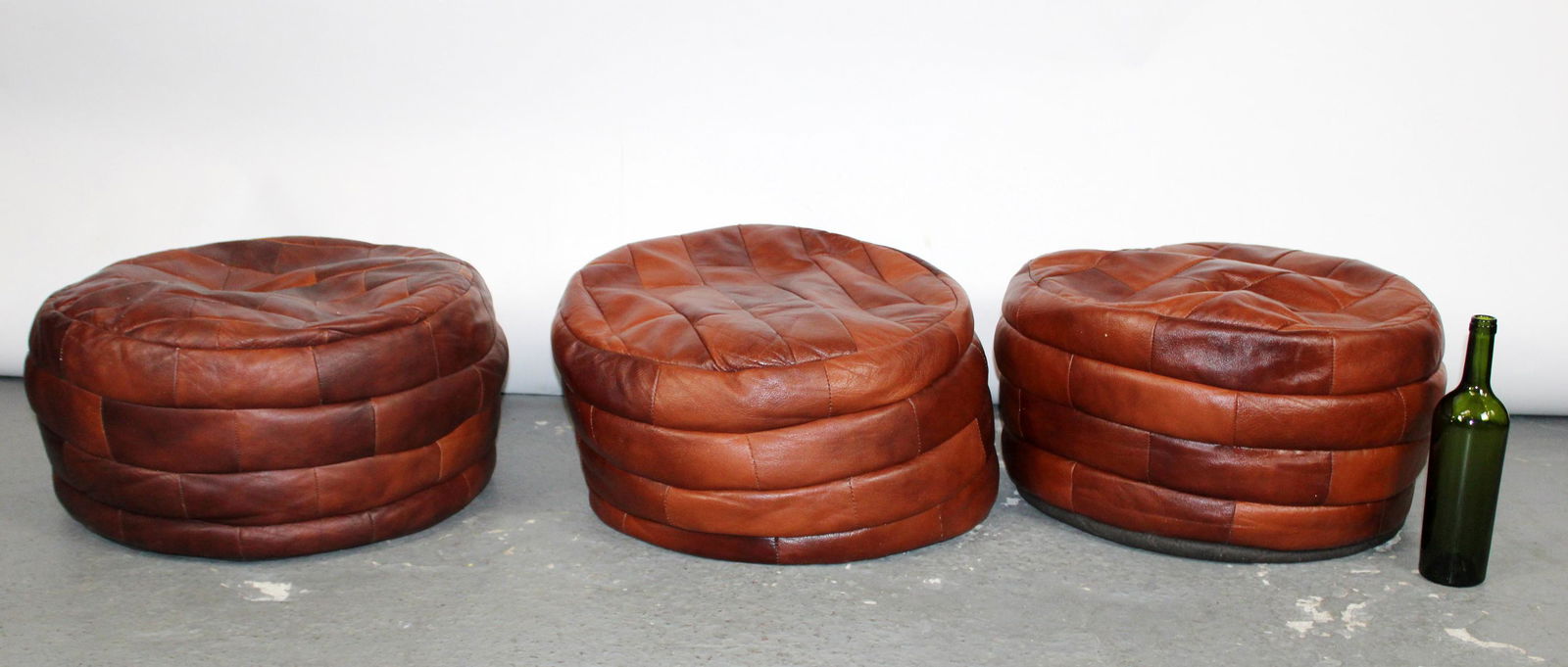 Lot of 3 leather pouf ottomans after design by De Sede (1 of 7)