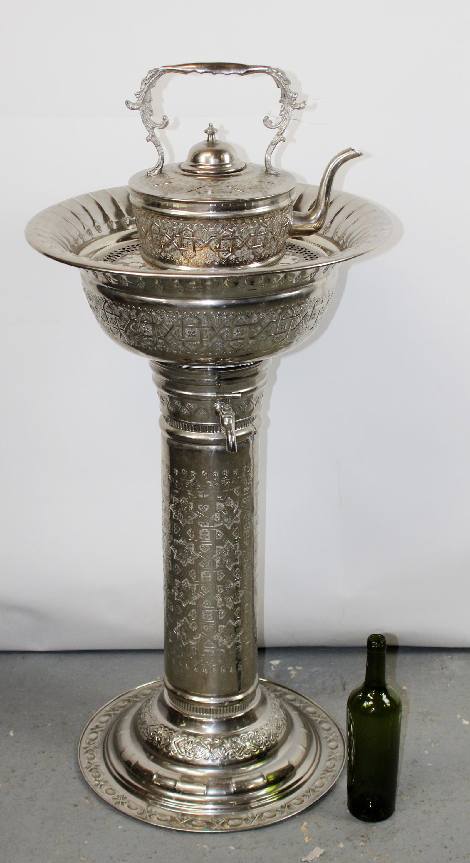 Moroccan ceremonial silver plate dry sink: Moroccan ceremonial silver plate dry sink with pitcher. 20th century. Base measures 34"h x 20"w, kettle measures 12"h x 13"w x 9"d