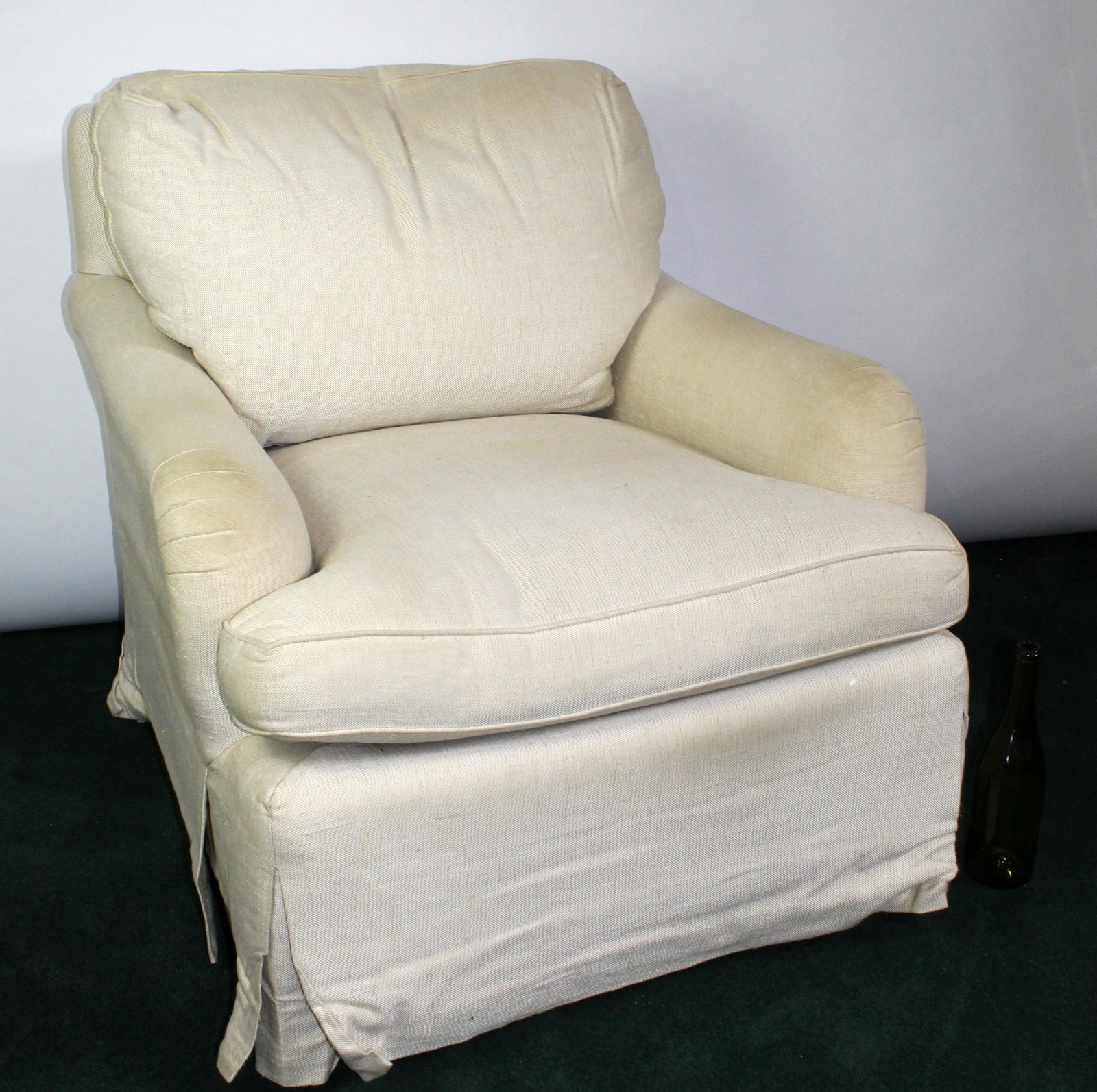 Cream upholstered armchair: Cream upholstered armchair. 21st century. 31"h x 33 1/2"w x 36"d