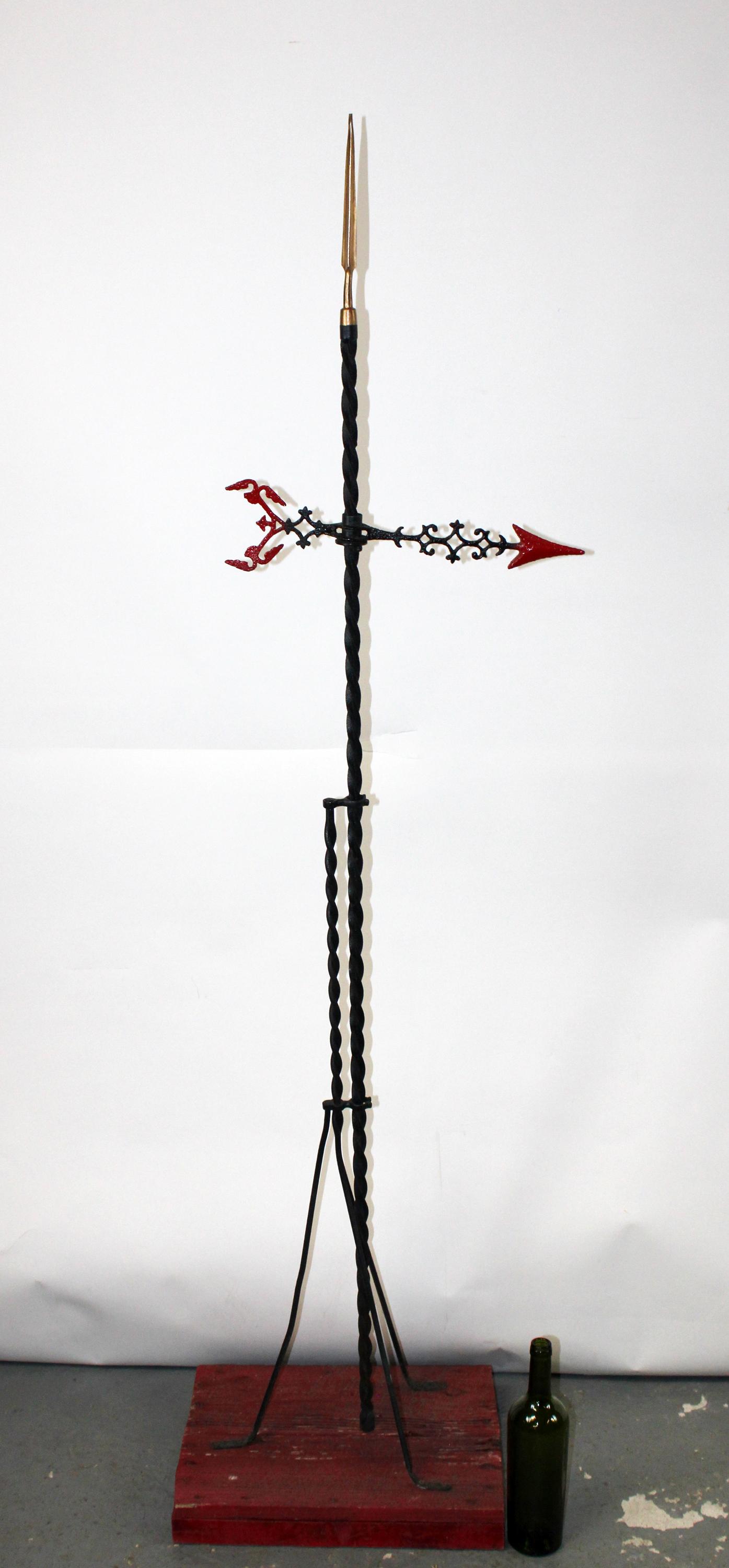 American Victorian iron lighting rod: American Victorian iron lighting rod on primitive wooden base. 69"h x 17 1/2"w x 14 1/2"d
