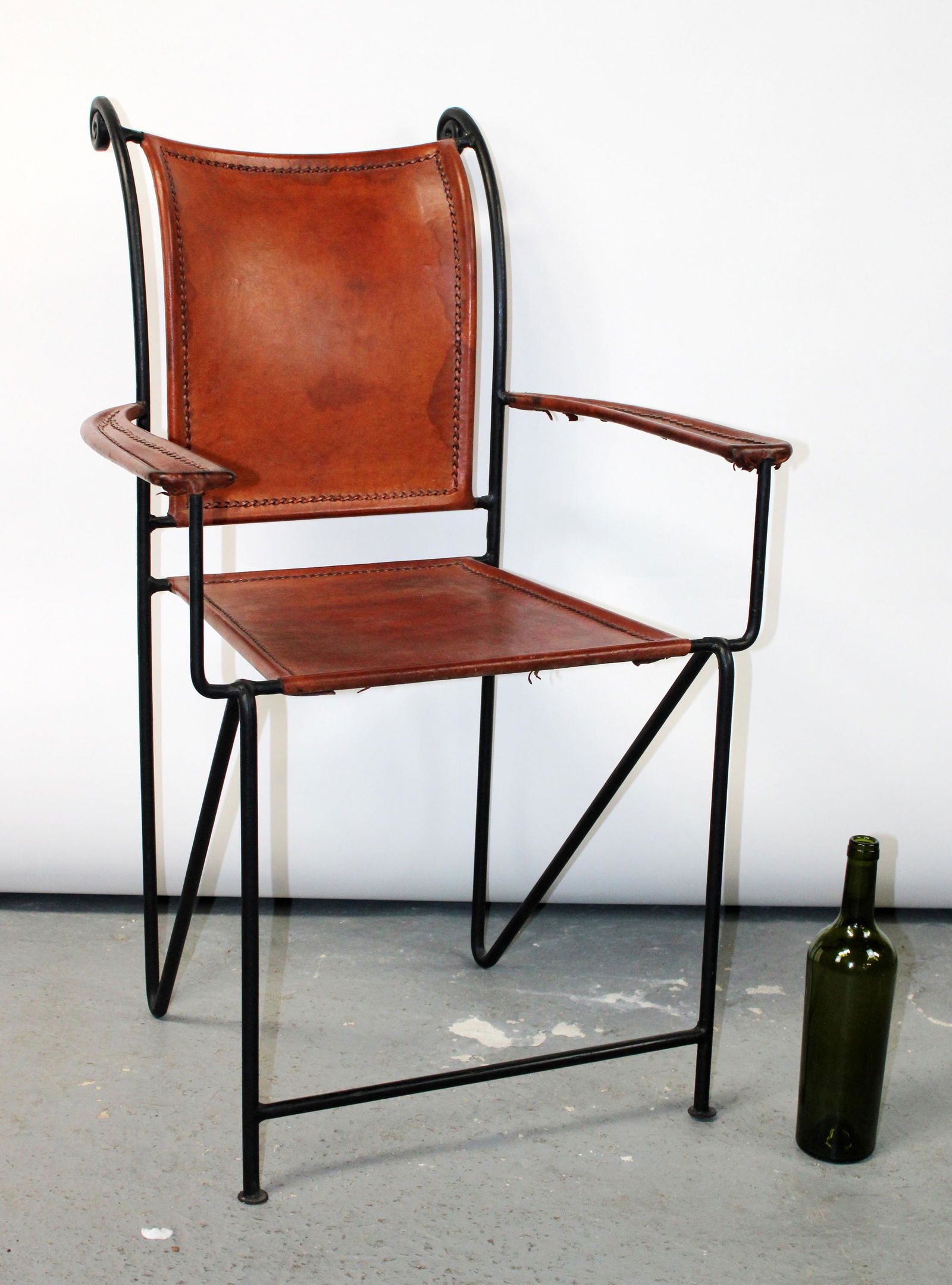 Wrought iron and stitched leather armchair (1 of 10)