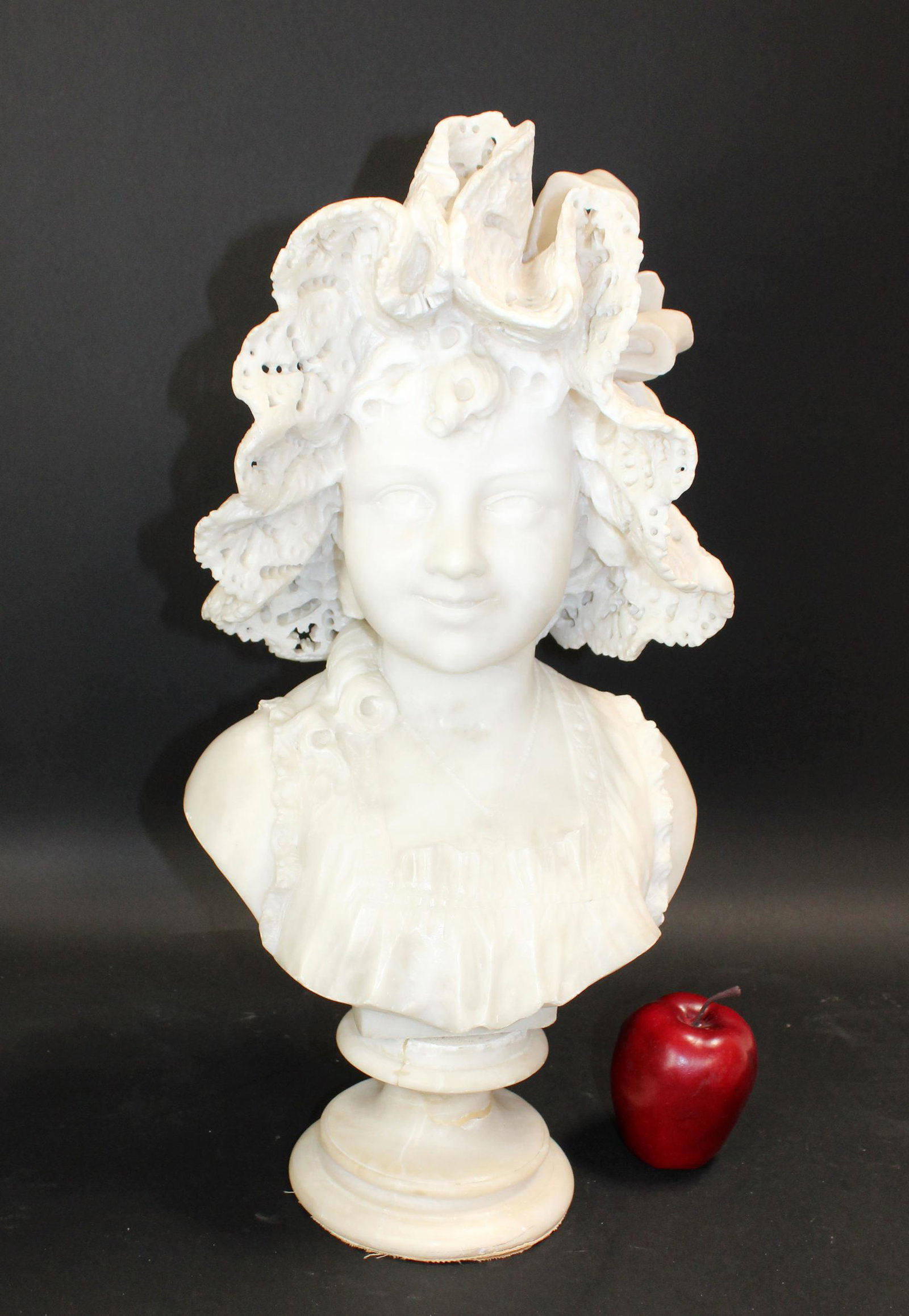 Carved alabaster bust of young girl with bonnet: Carved alabaster bust of young girl with bonnet. Early 20th century. 20"h x 10 1/4"w x 8"d