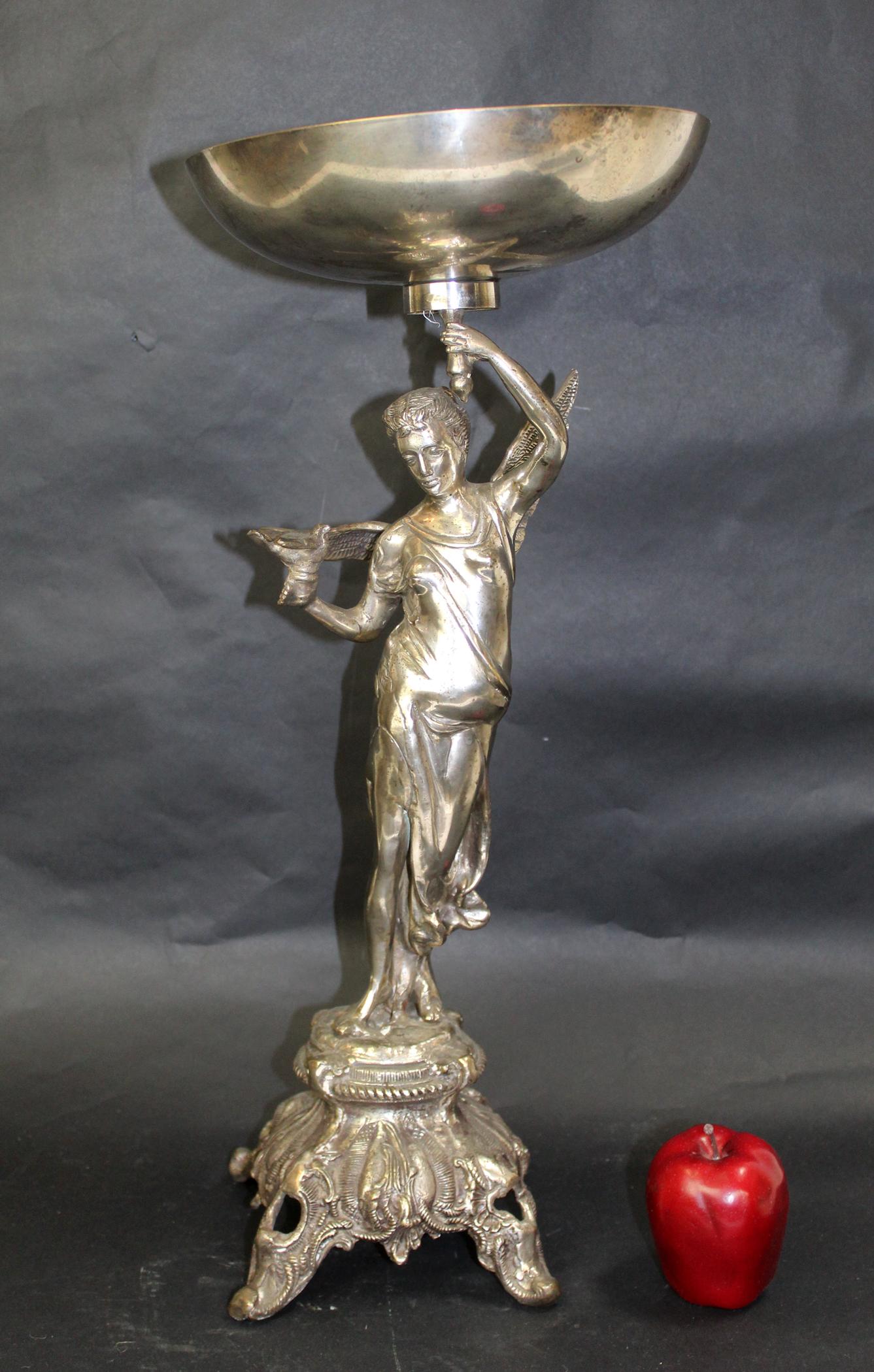 Silverplate angel form centerpiece compote: Silverplate angel form centerpiece compote. Late 20th century. 24"h x 10 1/4" dia overall