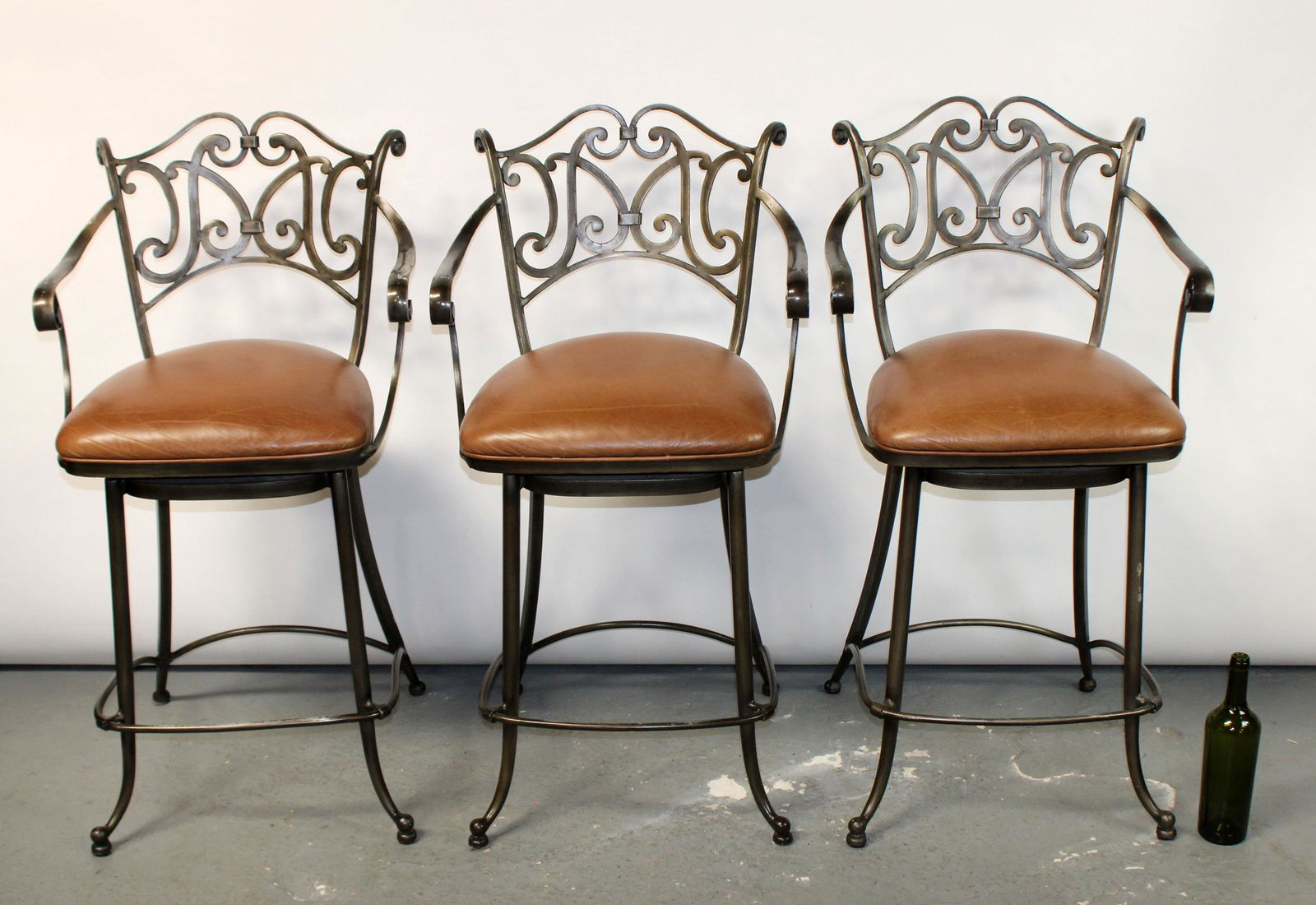 Set of 3 scrolled iron swivel bar stools (1 of 7)