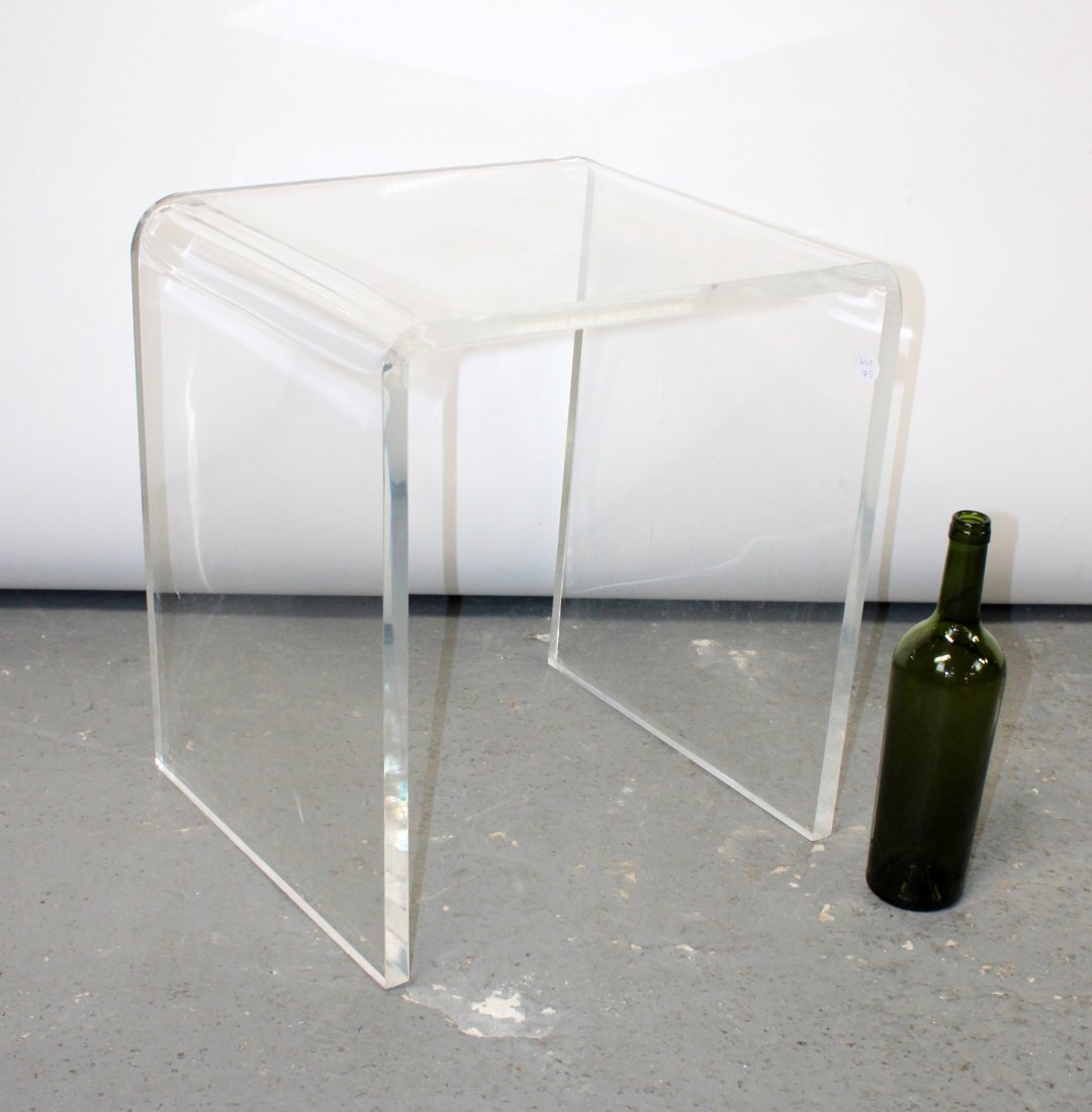 Lucite stool with waterfall edge: MCM style lucite stool with waterfall edge. 18"h x 16 1/2"w x 14"d