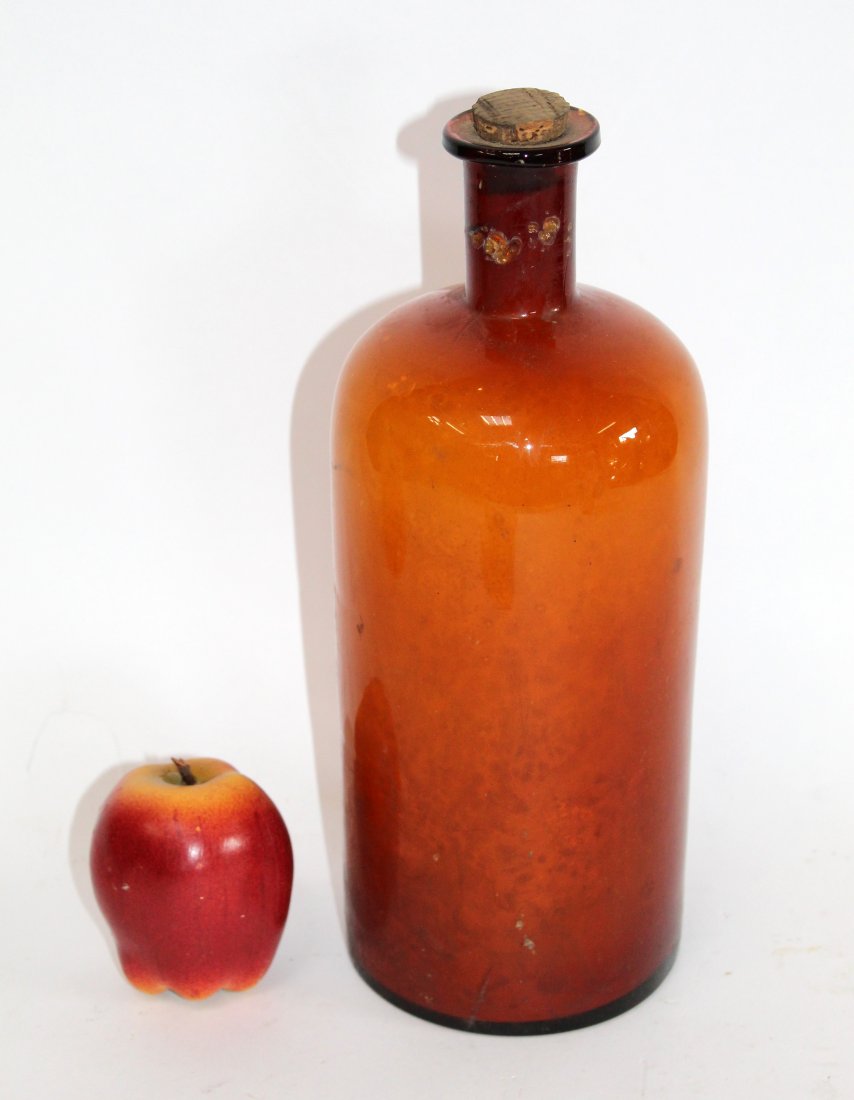 French amber glass apothecary jar: French amber glass apothecary jar. Mid 20th century. 12"h x 5" dia
