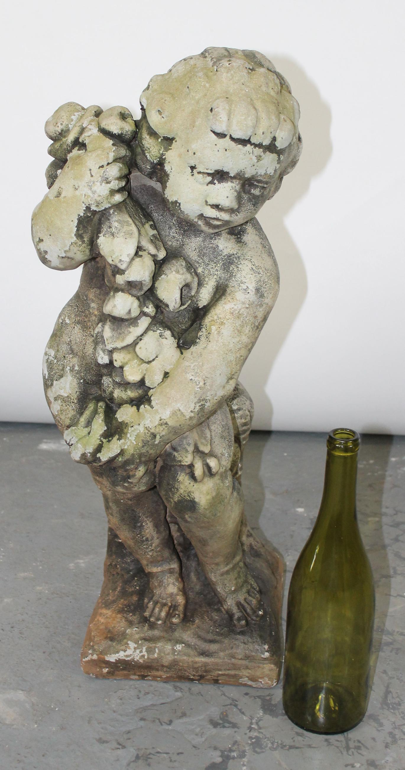 Cast garden statue of cherub (1 of 7)