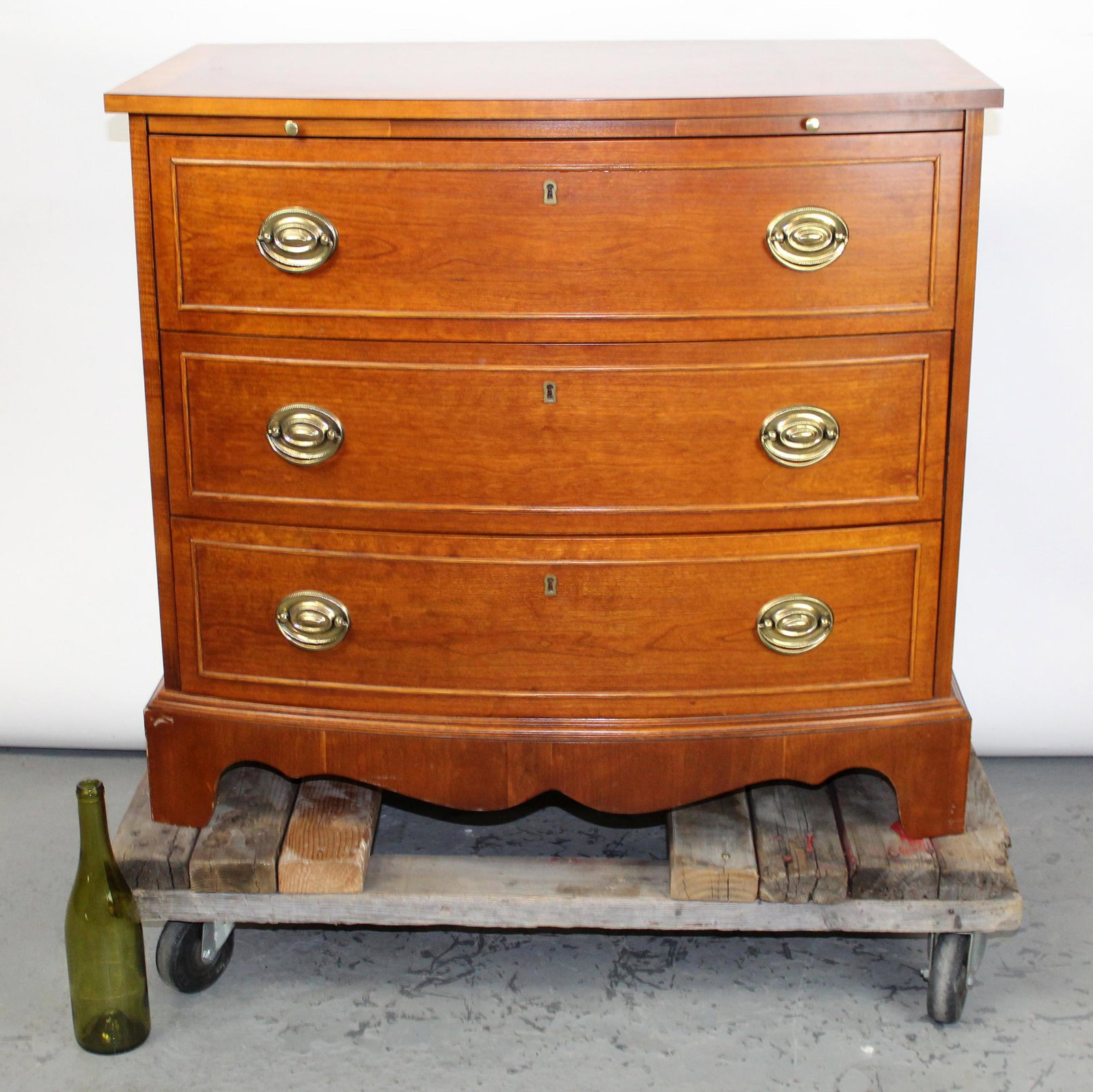 Banded mahogany bow front chest (1 of 9)